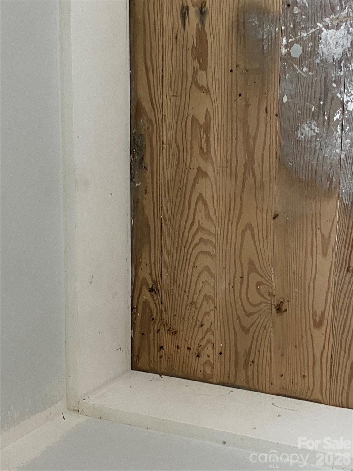 Beautiful real wood floors preserved and ready to be refinished in the front of the house - 615 Vine Arden Road, Morganton
