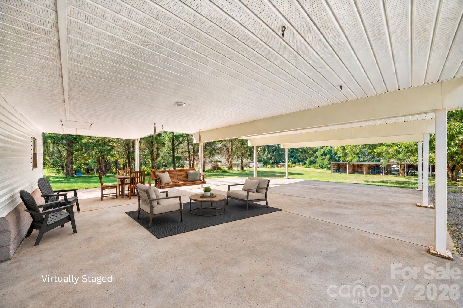 Virtually staged car port - 3 space car port with additional space to have patio furniture, grill area and to entertain - 109 Woodside Avenue, Gastonia