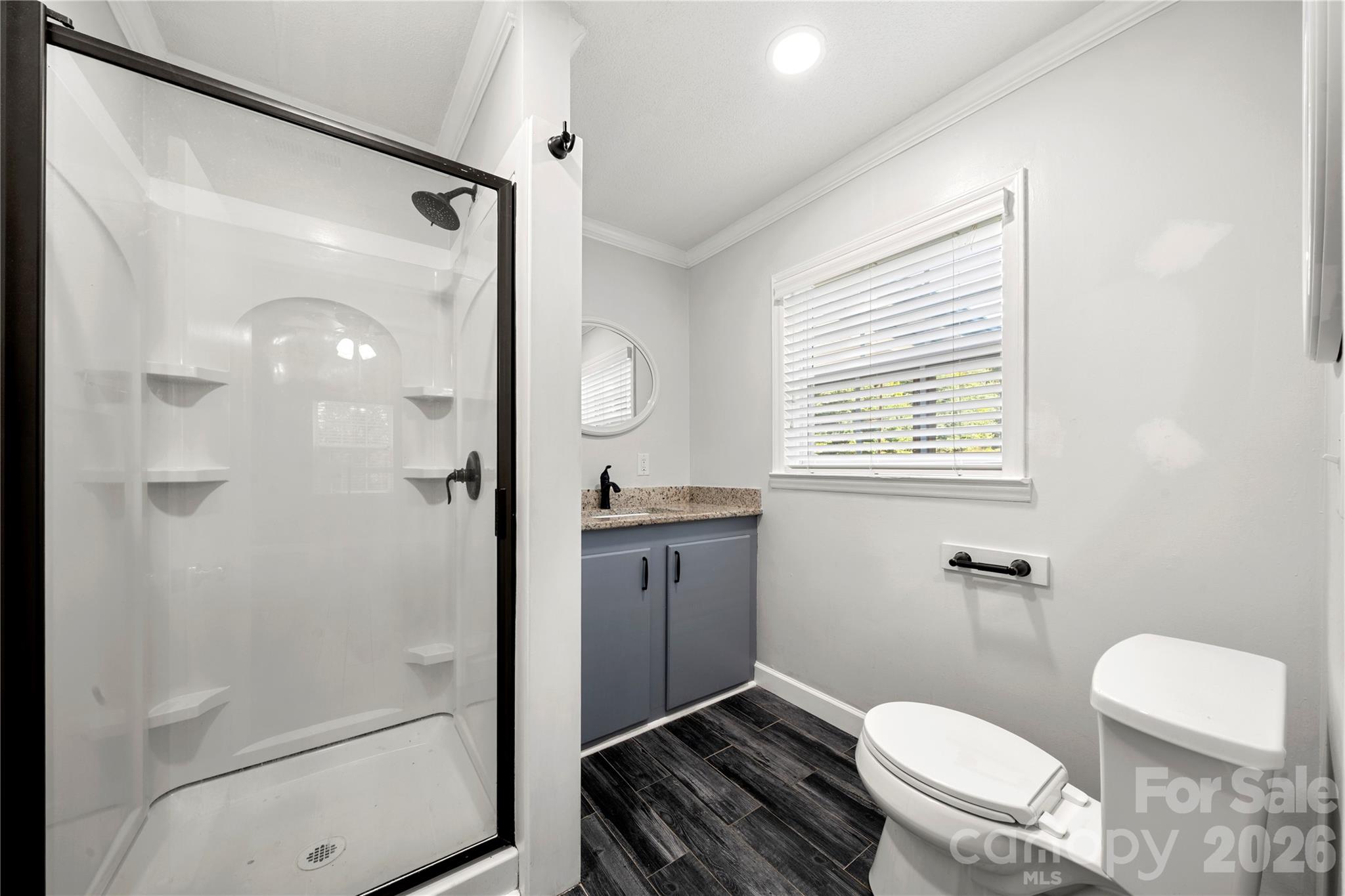Main level primary bathroom - 109 Woodside Avenue, Gastonia