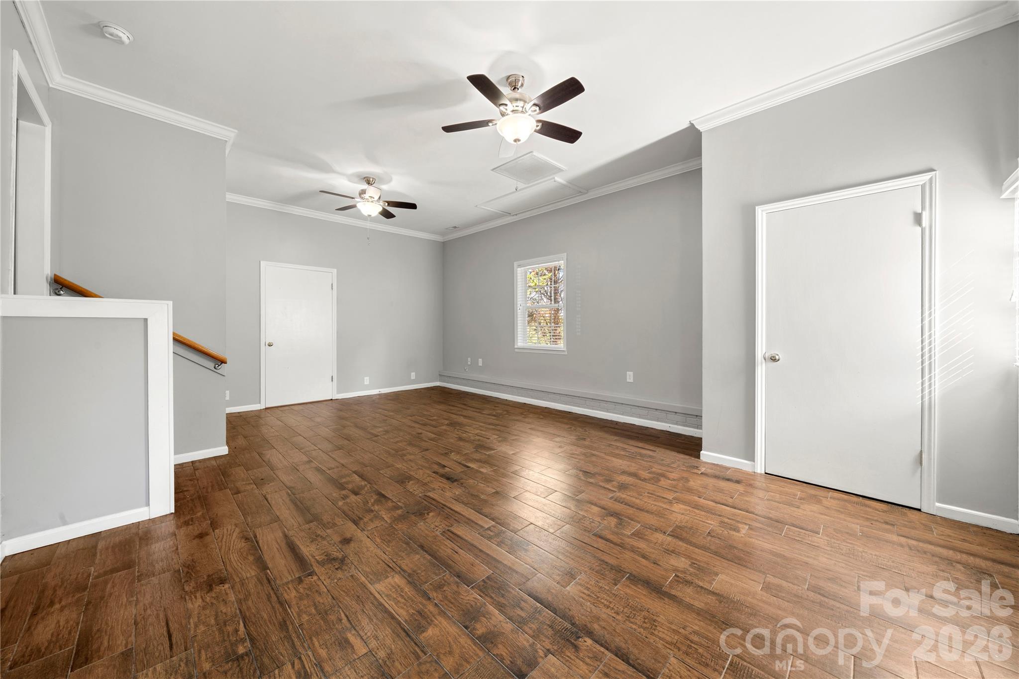 Main level living/bonus room - this room has its own external entry and connects to the laundry room - 109 Woodside Avenue, Gastonia