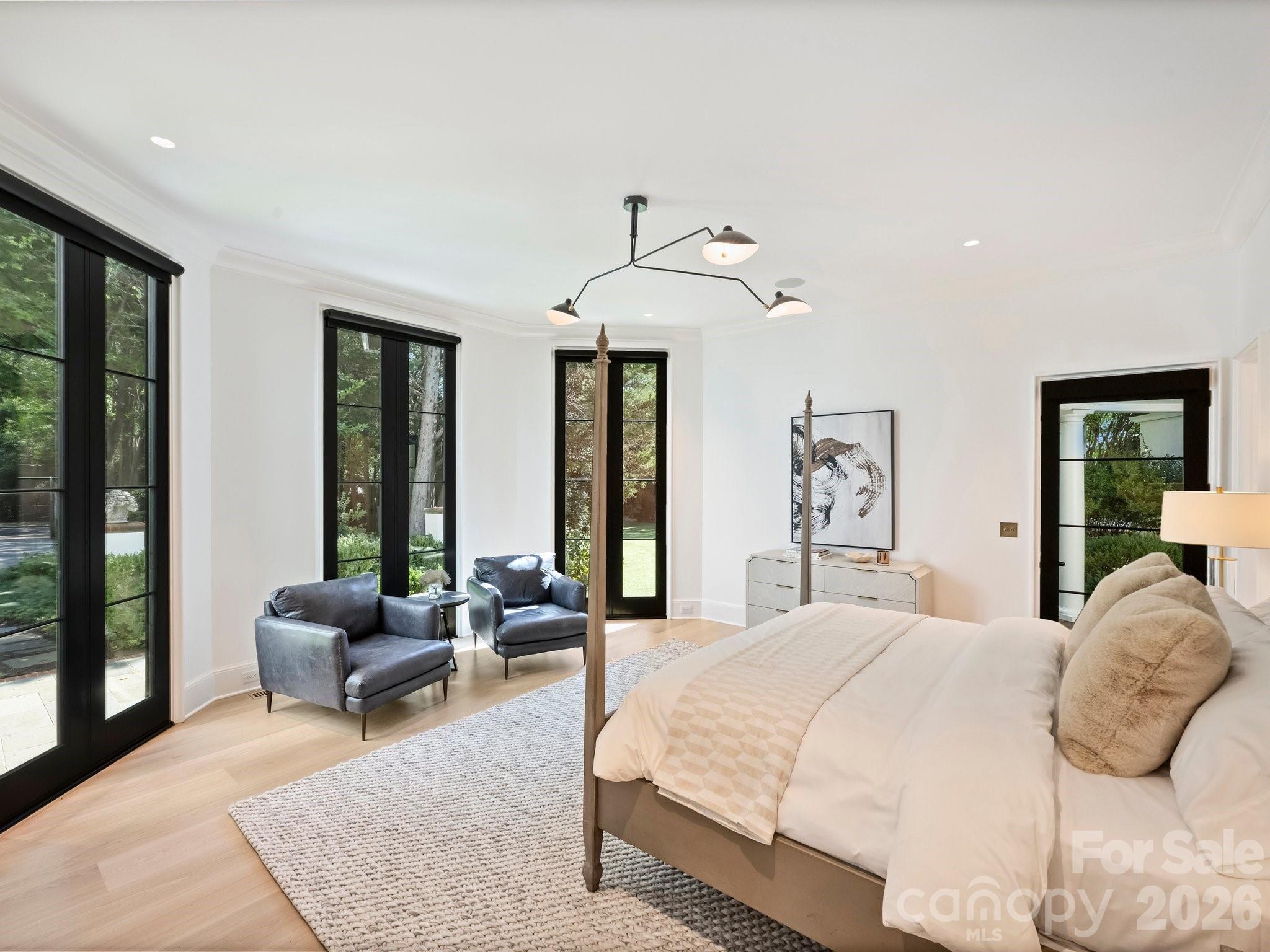 Primary Suite is located on it's own wing with floor to celing glass doors overlooking your courtyard - 600 Hermitage Road, Charlotte