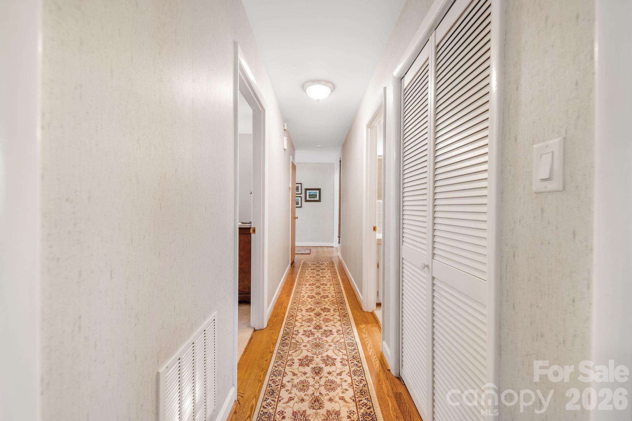Hall way to bathroom and 3 bedrooms - 1 Pheasant Ridge Drive, Asheville