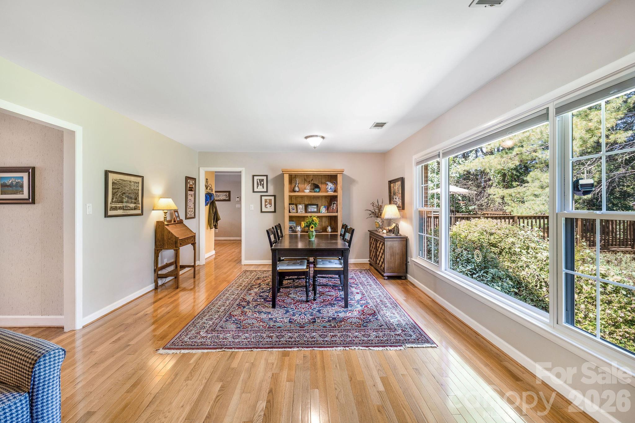 Dining area with huge picture window. - 1 Pheasant Ridge Drive, Asheville