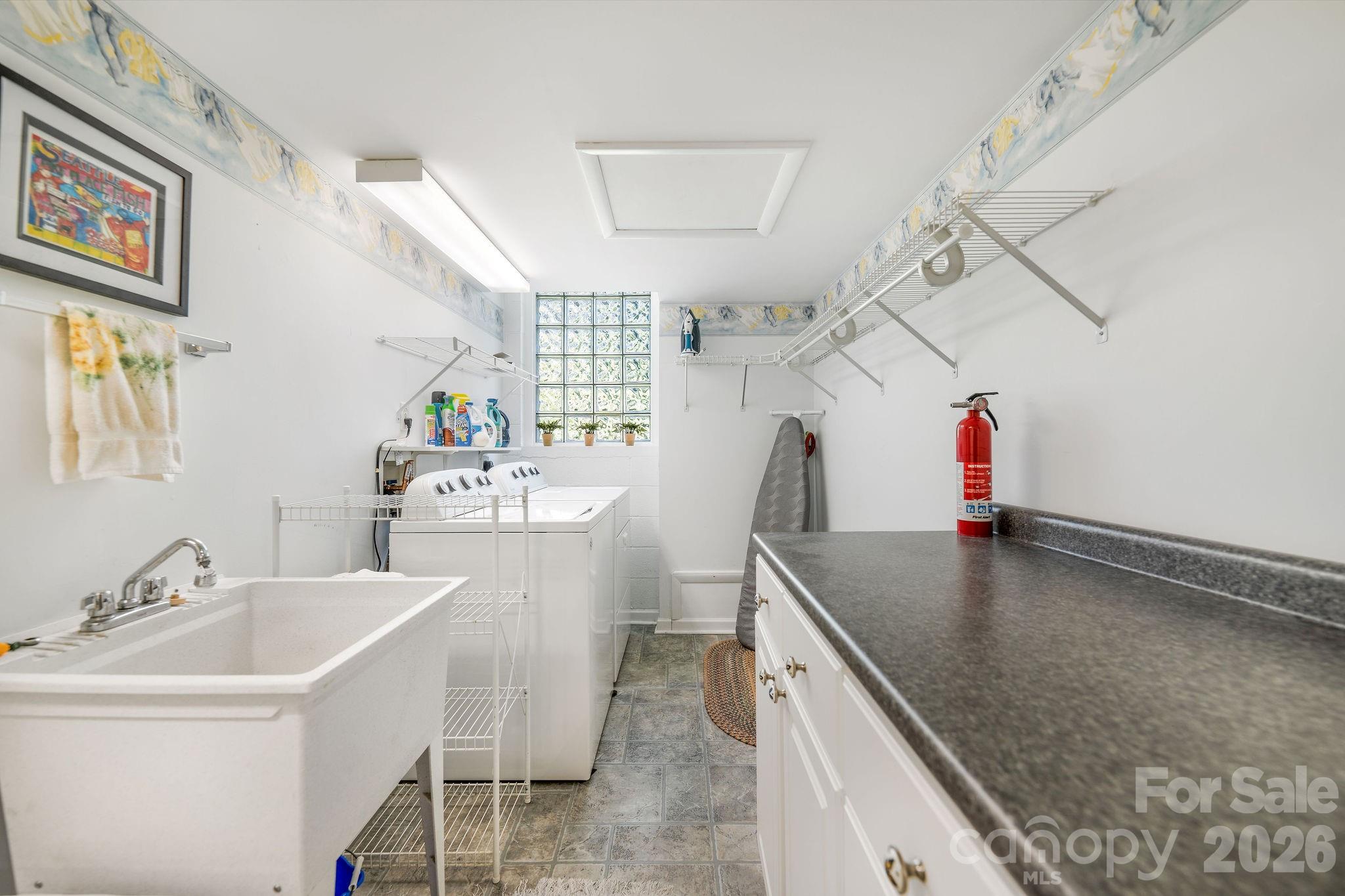 Lower level laundry room - 1 Pheasant Ridge Drive, Asheville