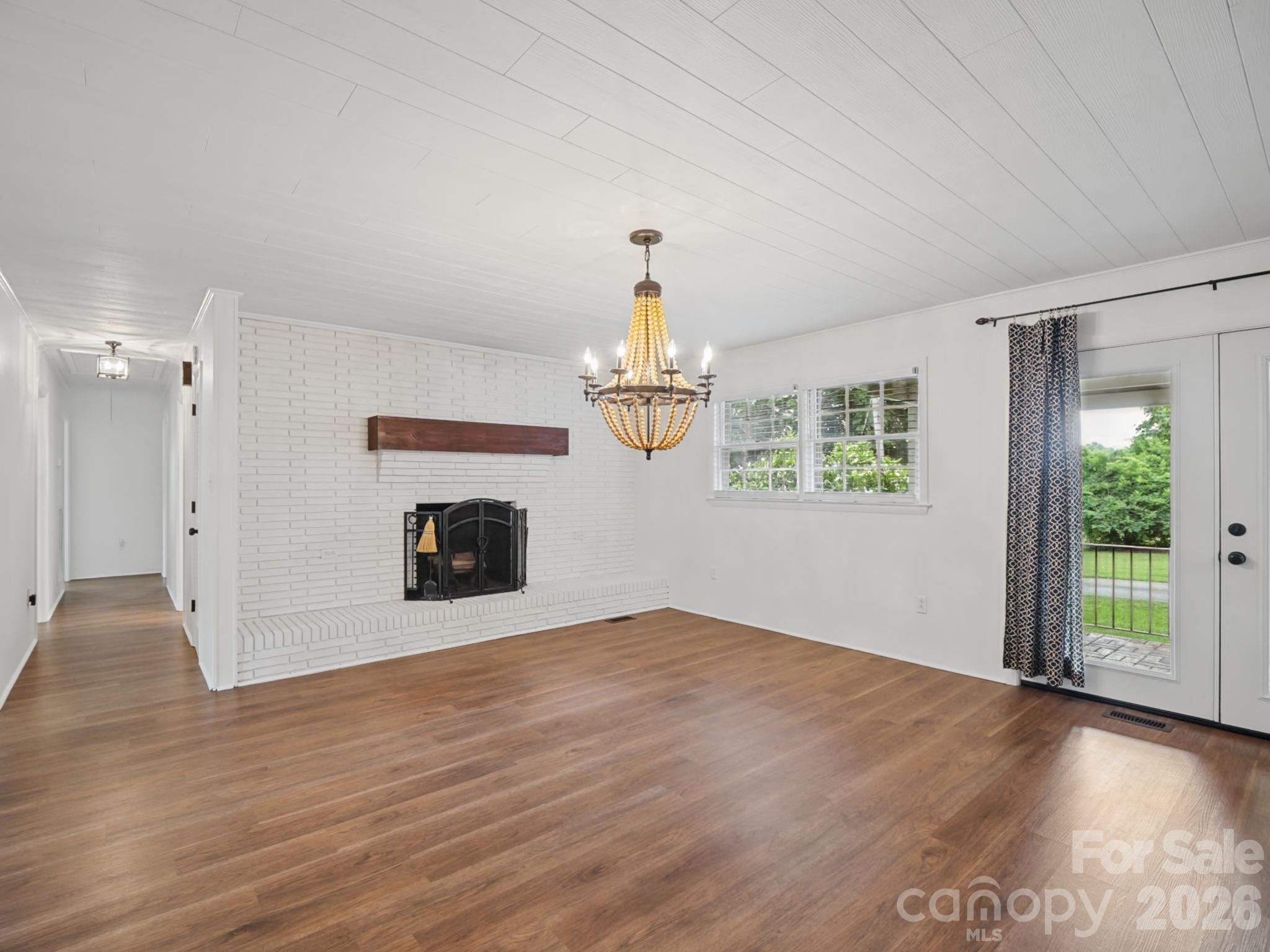 Dining Room with wood burning fireplace - 477 Butler Road, Forest City