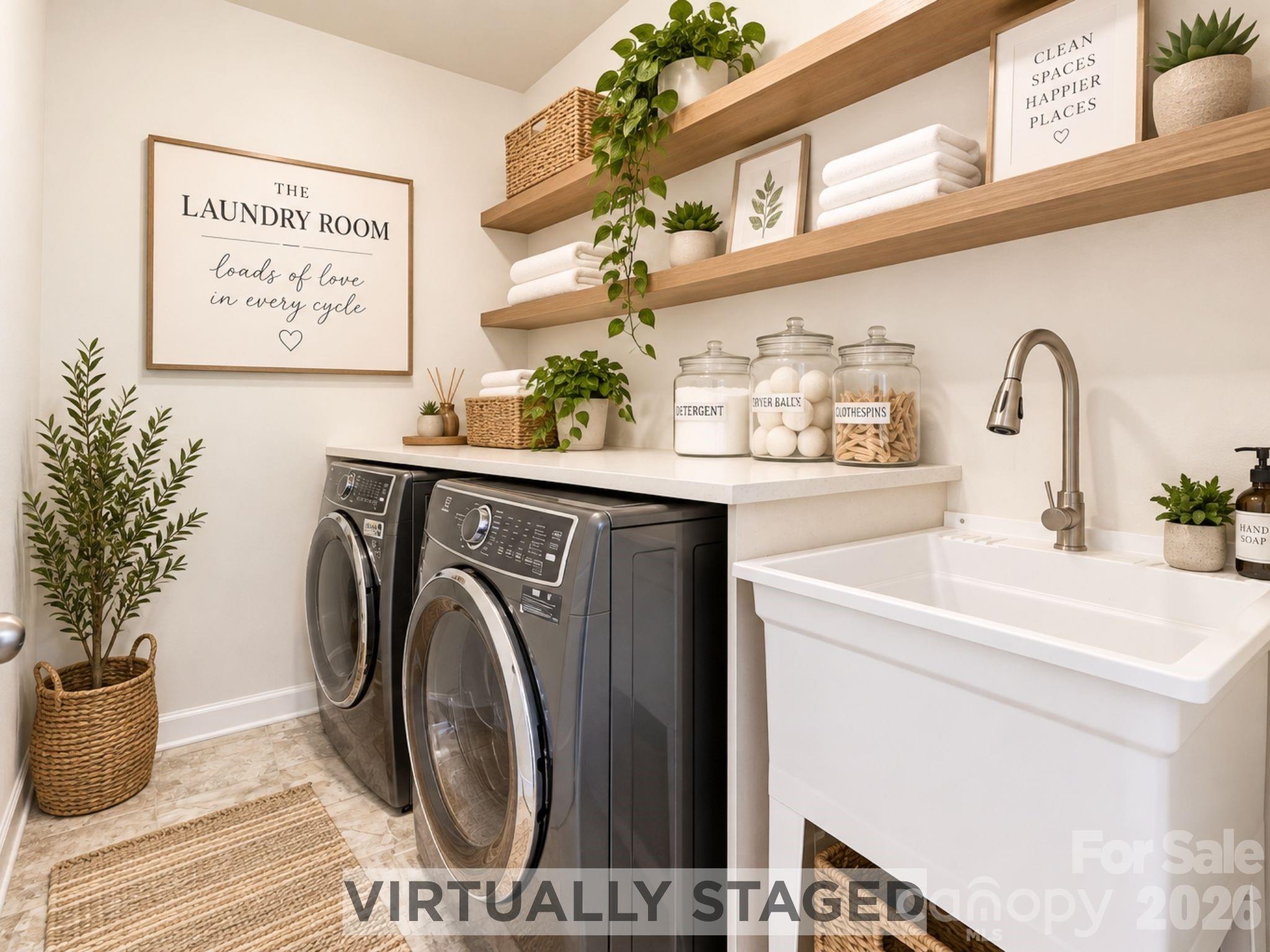 Virtually staged to showcase its potential, the spacious laundry room offers room for a folding counter, open storage shelves and beautifully organized essentials, while the utility sink makes everyday tasks feel easier and more efficient. - 8315 Breton Way, Harrisburg