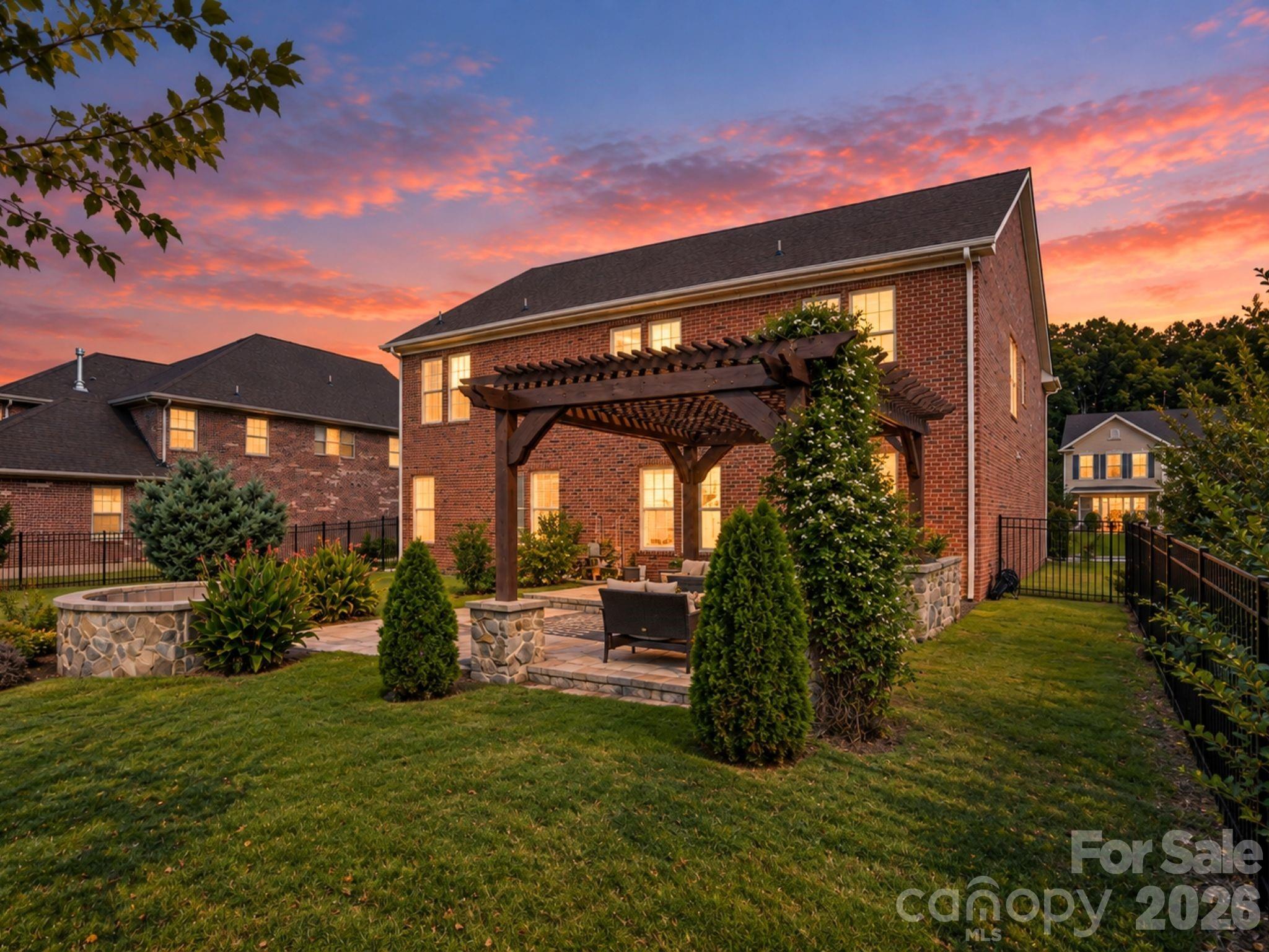 As the day calms and the comfort of home calls you to settle in, dinners linger beneath the pergola, conversations continue around the fire pit, and ordinary evenings turn into the memories you’ll carry with you. - 8315 Breton Way, Harrisburg