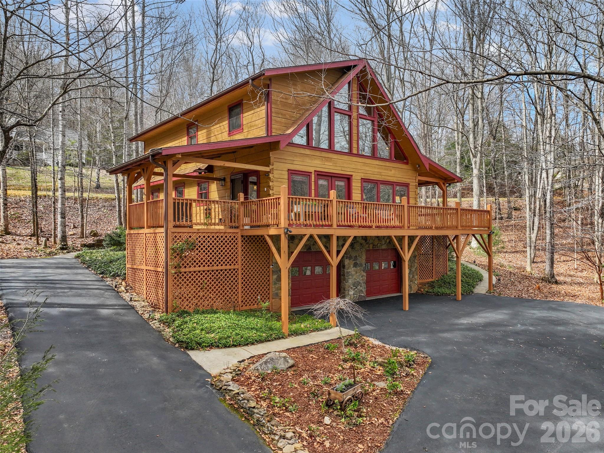 A ramp runs around the back of the house to the first floor- providing wheelchair access - 133 Smokemont Drive, Arden
