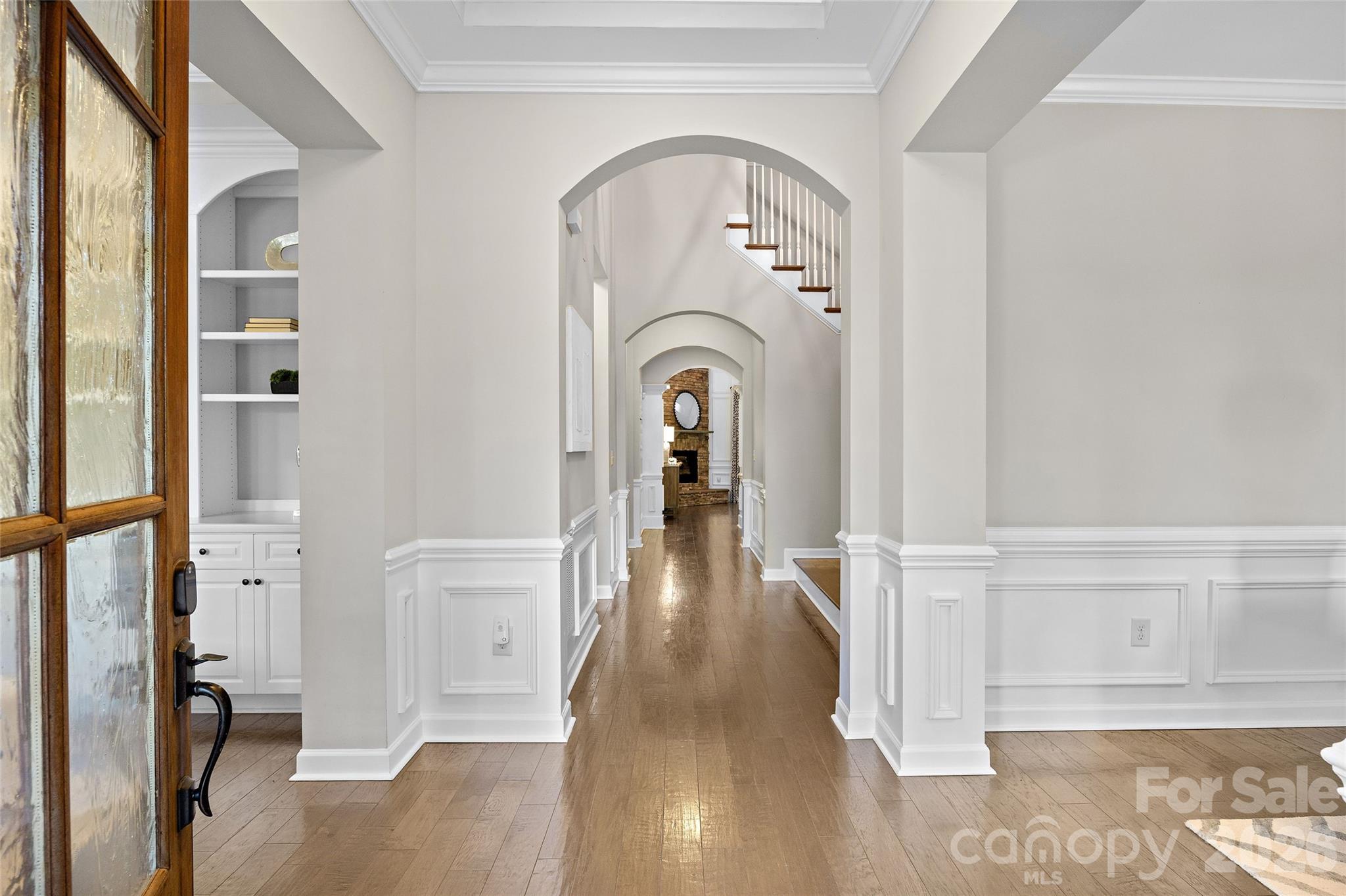 Front entry immediately greets you to beautiful architectural details - 1623 Hawkstone Drive, Waxhaw