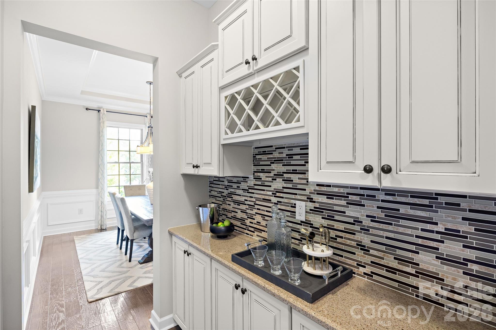 Butlers pantry connects the dining room to the kitchen - 1623 Hawkstone Drive, Waxhaw