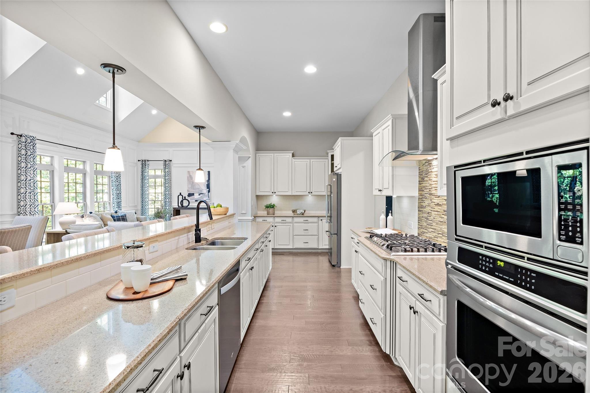 Beautiful kitchen with plenty of cabinet space and a large walk-in pantry around the corner from the kitchen - 1623 Hawkstone Drive, Waxhaw