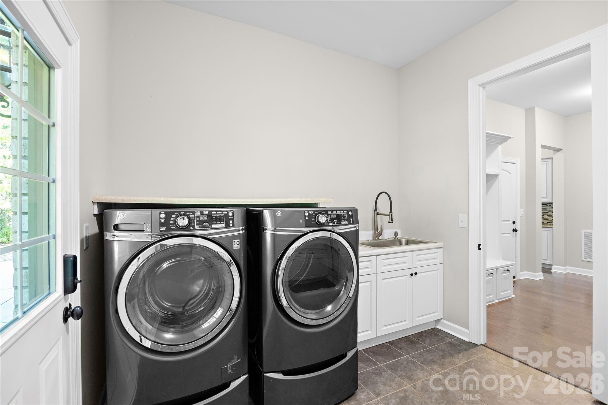 Laundry room on the main level - 1623 Hawkstone Drive, Waxhaw