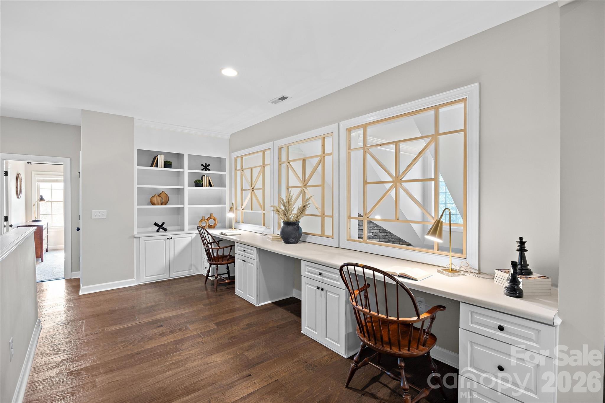 Upstairs features a beautiful loft/desk space that overlooks the downstairs main living areas. - 1623 Hawkstone Drive, Waxhaw
