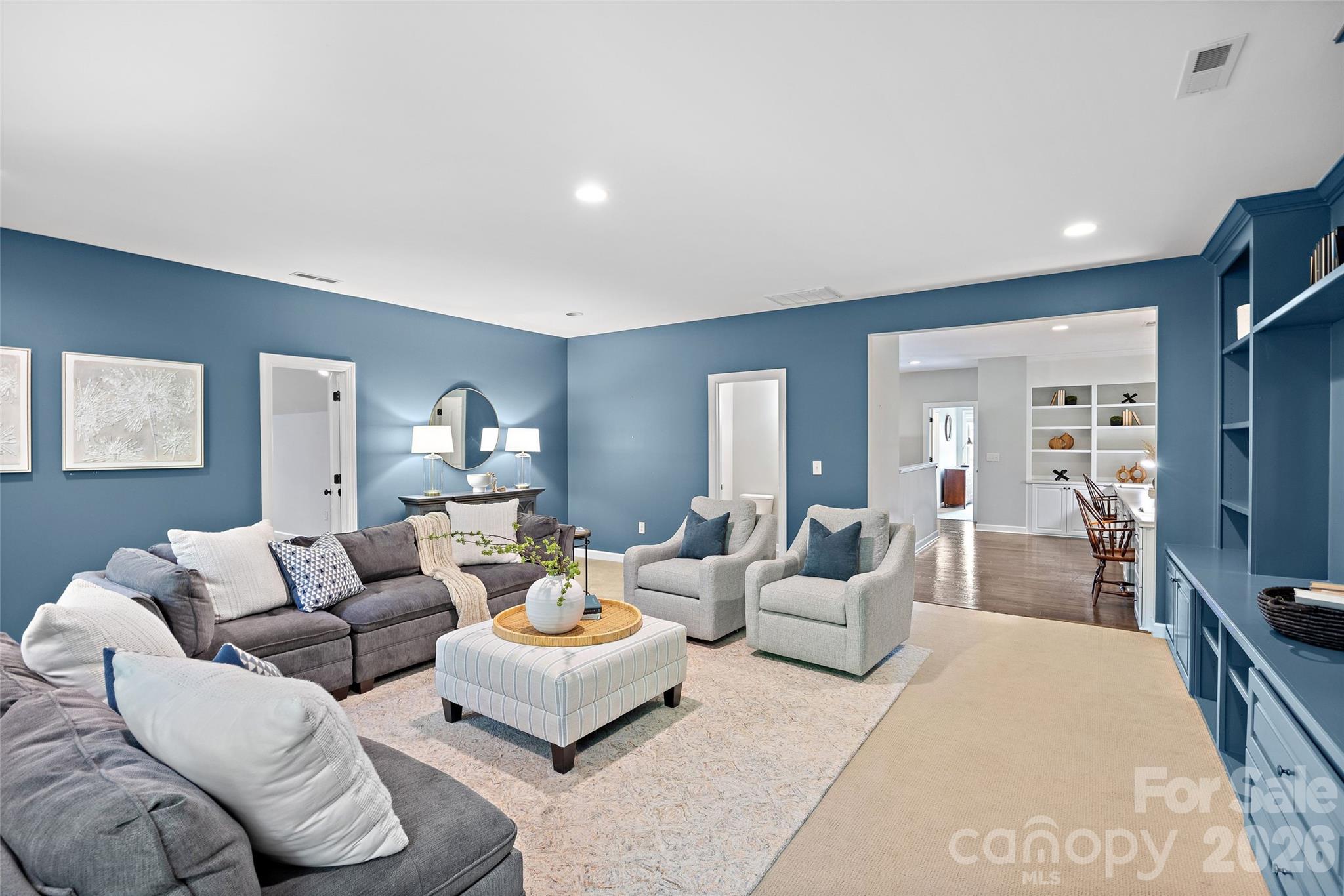 Spacious bonus upstairs features lovely built-ins, another half bath, and a separate flex space that would make for a great workout room! - 1623 Hawkstone Drive, Waxhaw