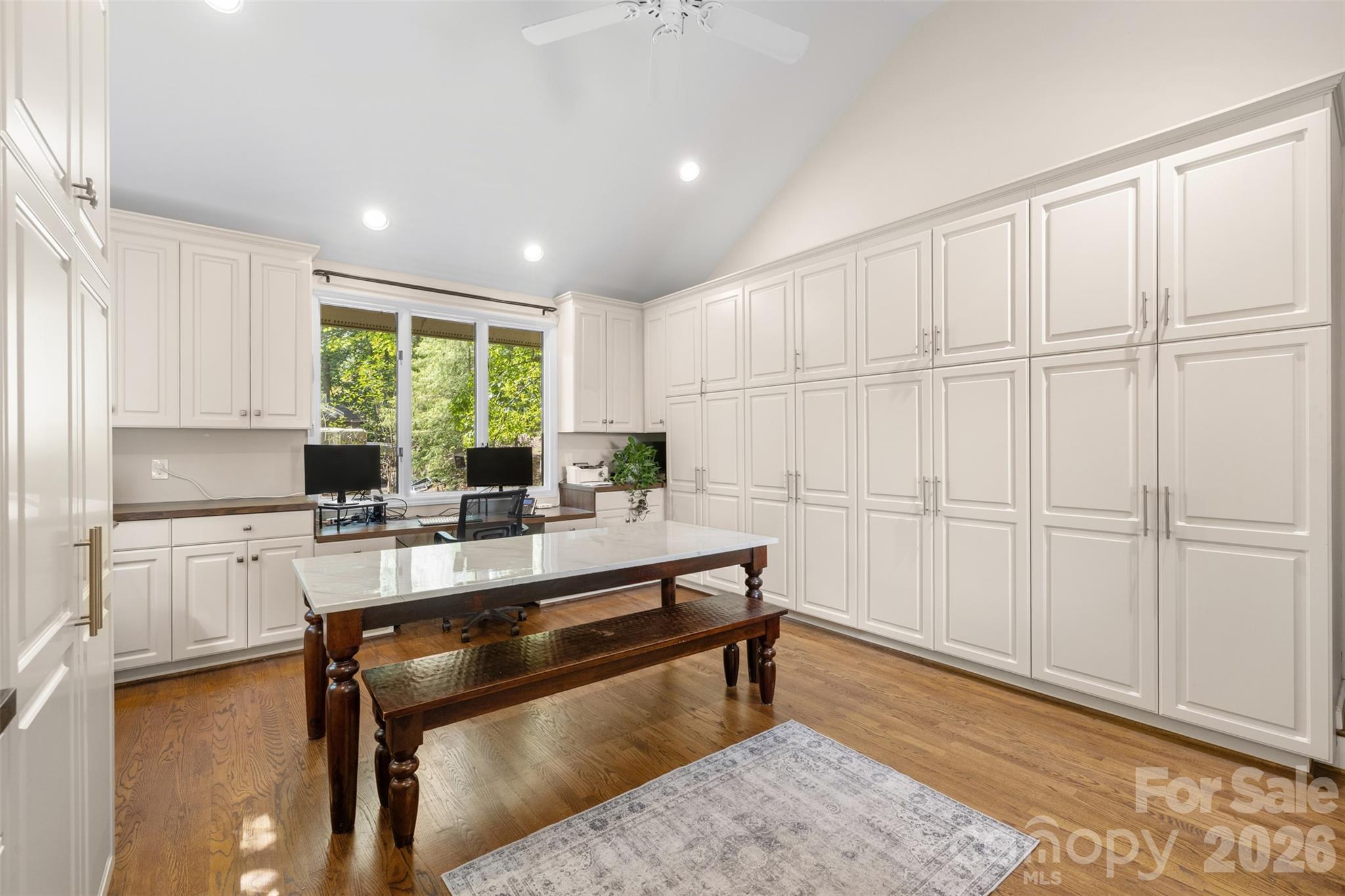 No complaining about a lack of storage!  This room off the kitchen offers storage, workspace, homework, home gym, etc. - 27 Timberidge Drive, Lake Wylie