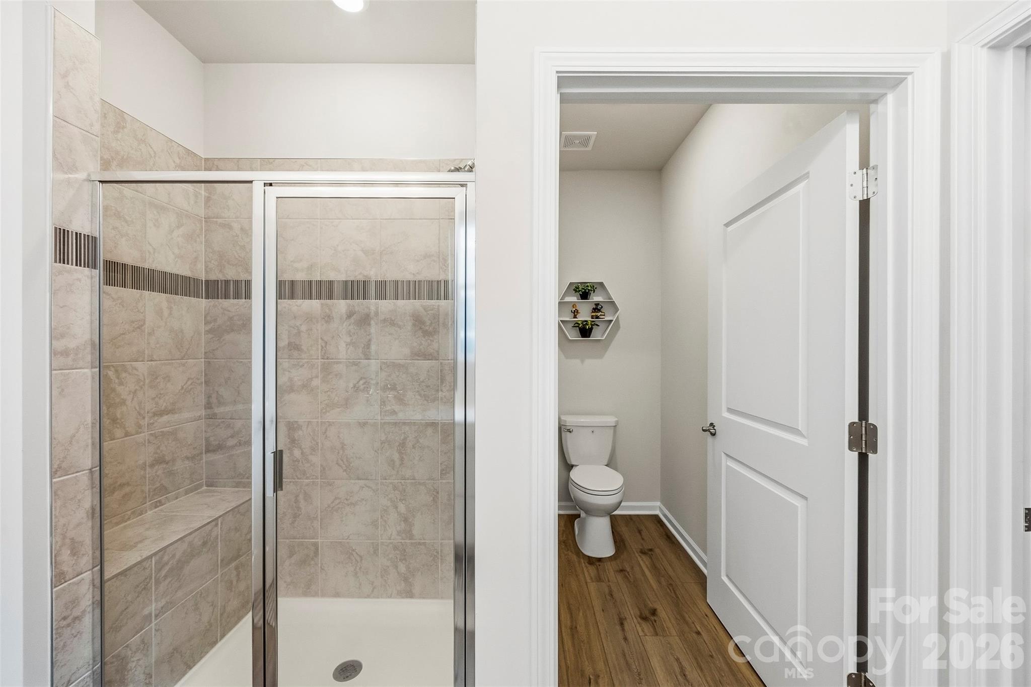 Primary BA walk in tile shower. - 1734 Otter Perch Lane, Fort Mill