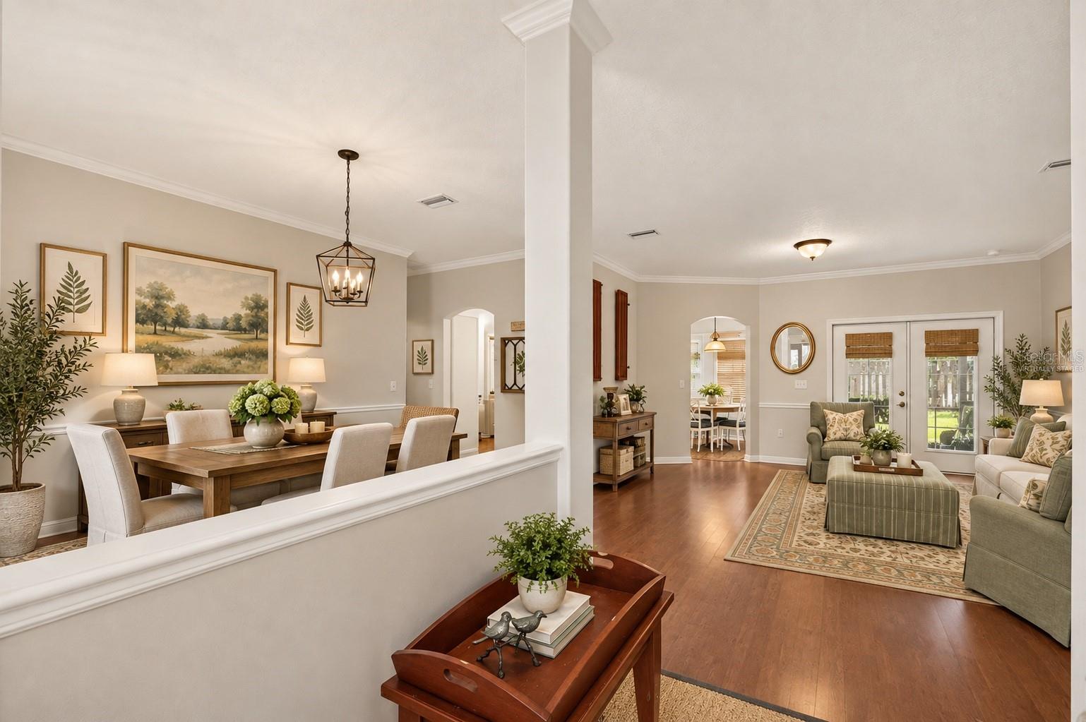Open plan virtually staged; viewed from foyer - 6618 SW 83RD TER, GAINESVILLE