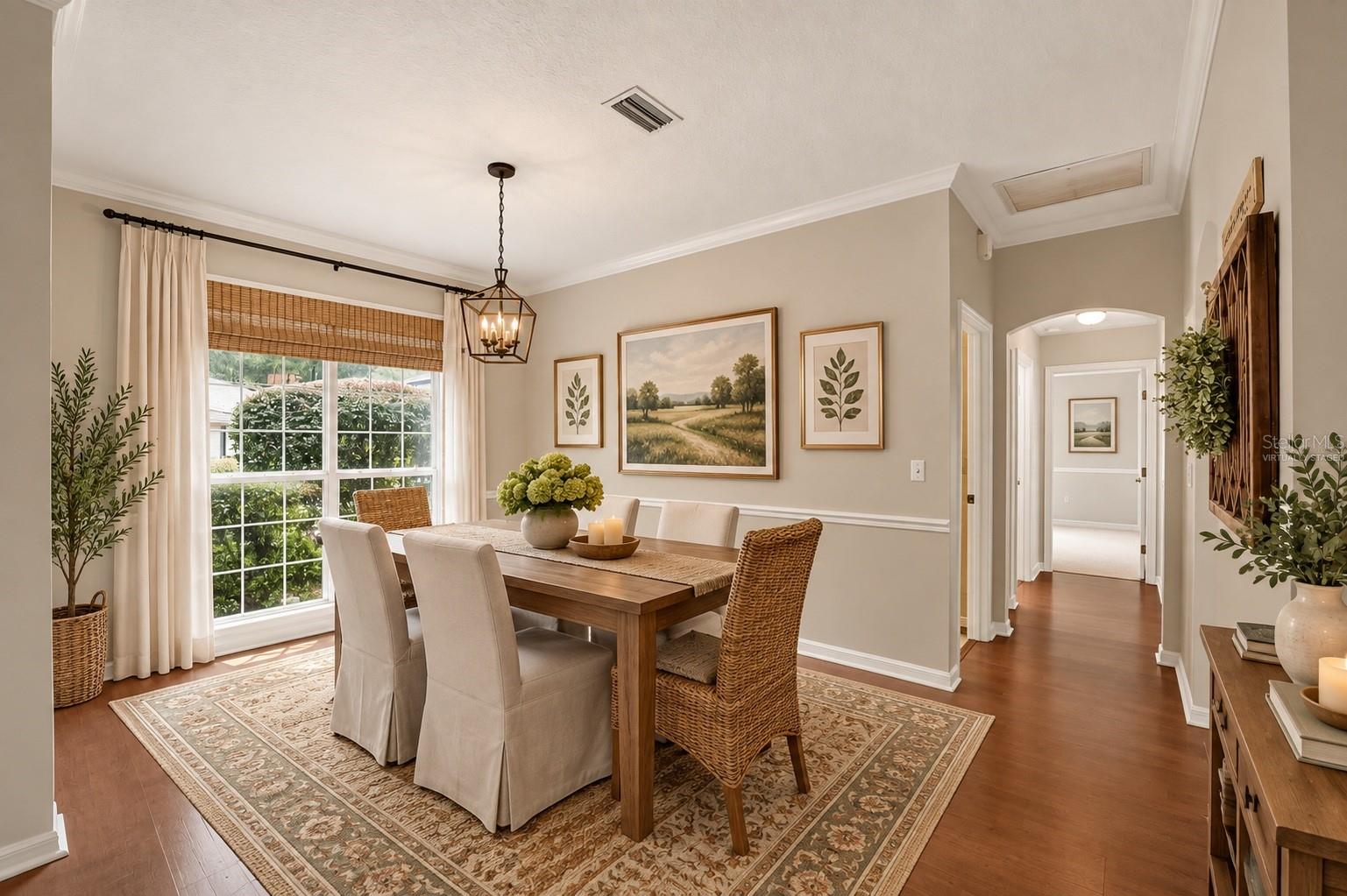 Dining room off foyer, virtually staged - 6618 SW 83RD TER, GAINESVILLE