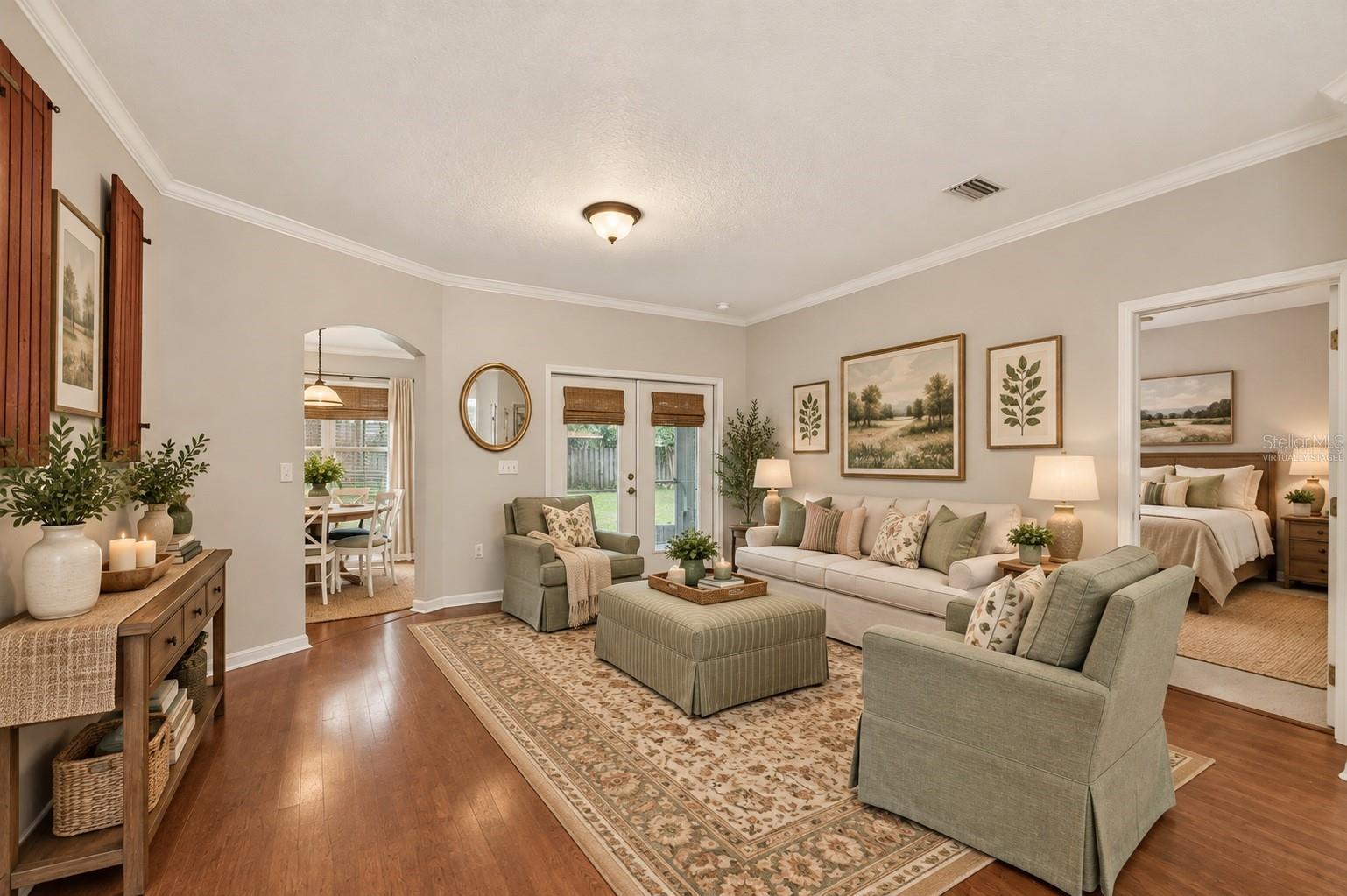 Virtually staged living room off kitchen - 6618 SW 83RD TER, GAINESVILLE