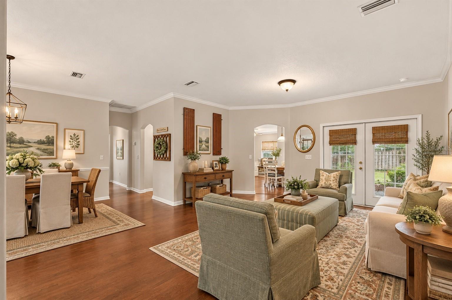 Virtually staged living room off kitchen - 6618 SW 83RD TER, GAINESVILLE