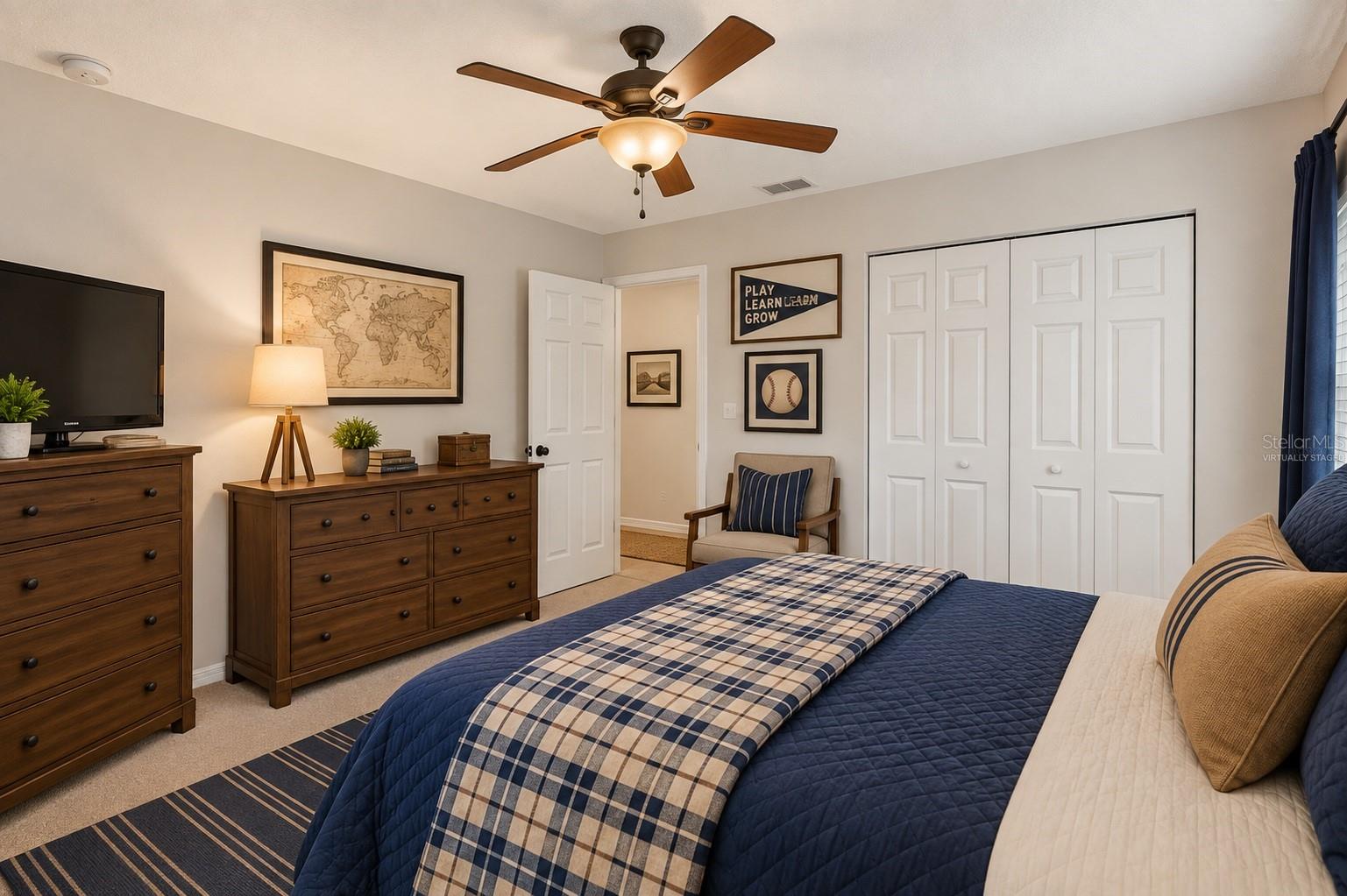 One of three large secondary bedrooms in 3-way split configuration, virtually staged - 6618 SW 83RD TER, GAINESVILLE