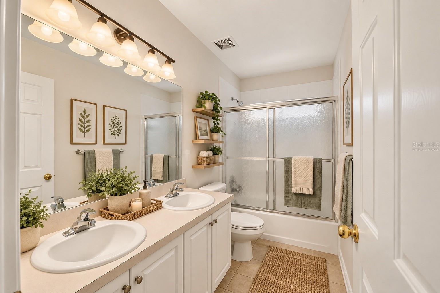 One of three bathrooms, virtually staged - 6618 SW 83RD TER, GAINESVILLE
