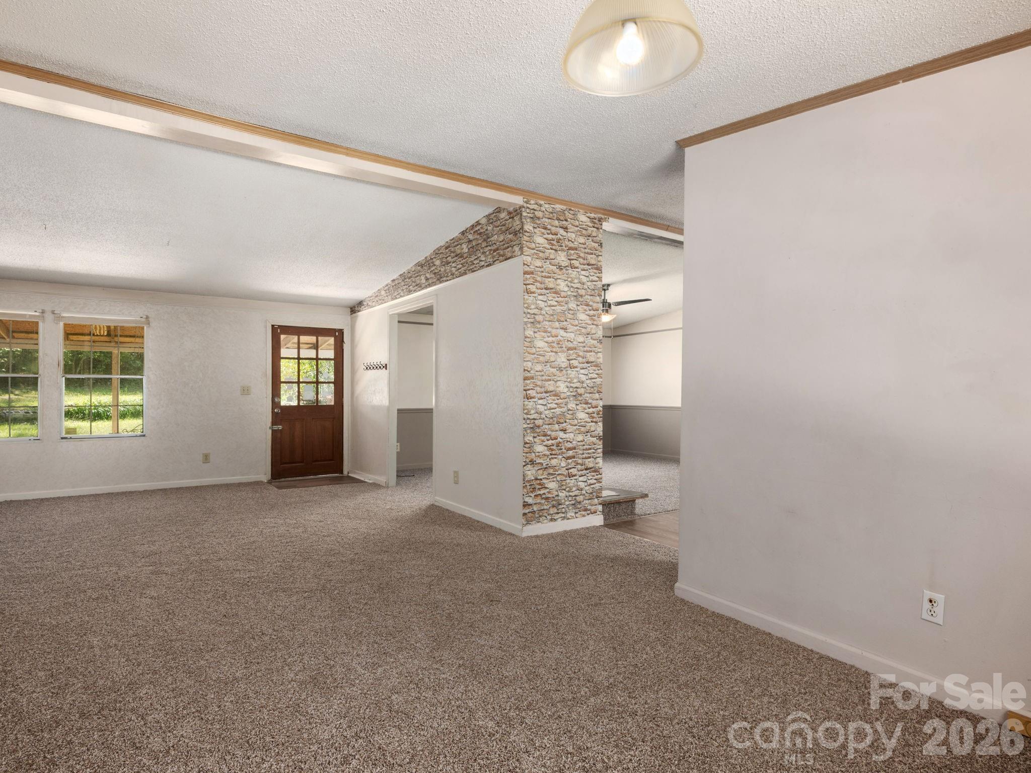 Easy Flow from the Living Room to Dining/Kitchen - 628 Grassy Knob Road, Rutherfordton
