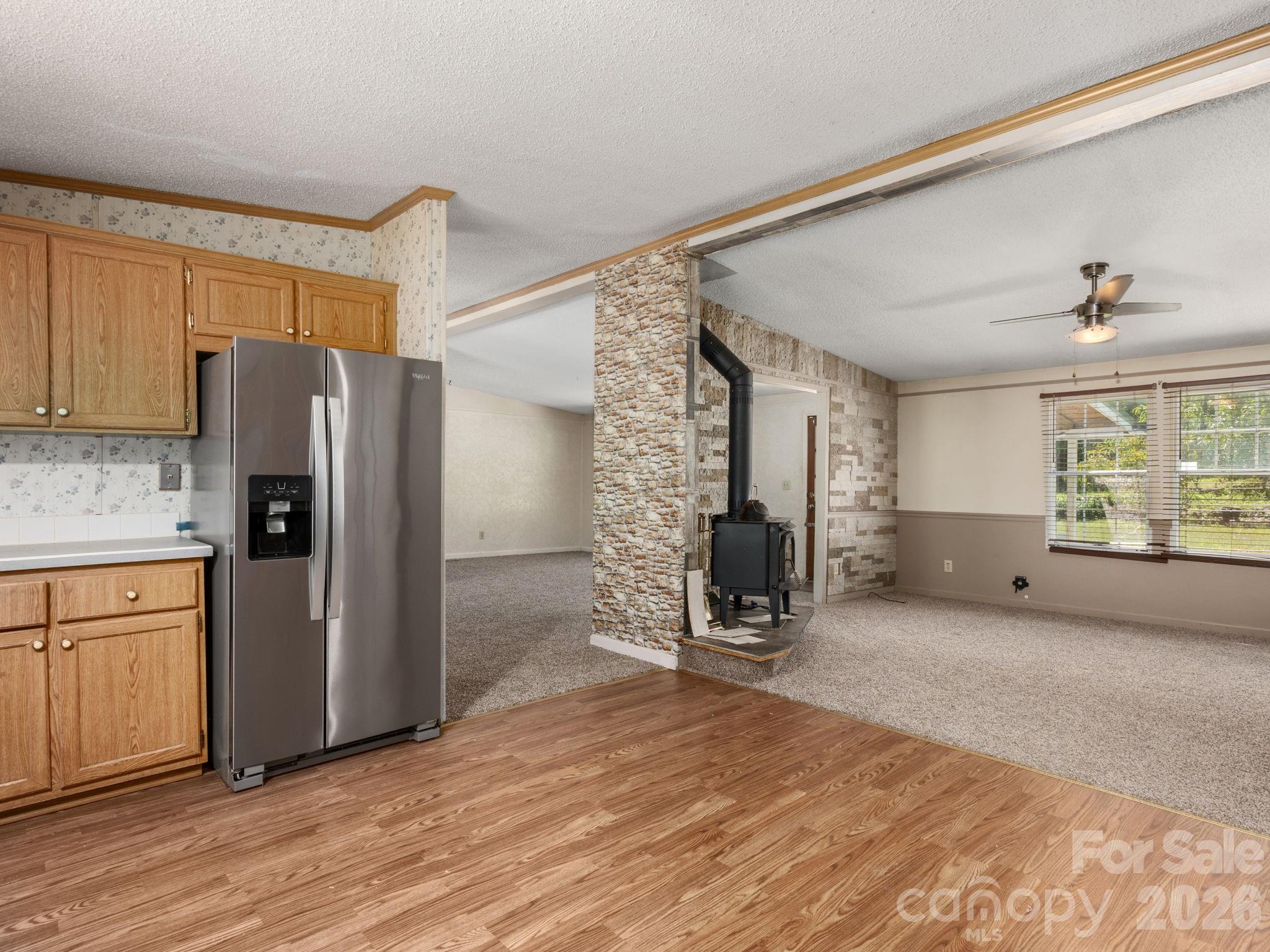 Kitchen Opens to Cozy Den - 628 Grassy Knob Road, Rutherfordton