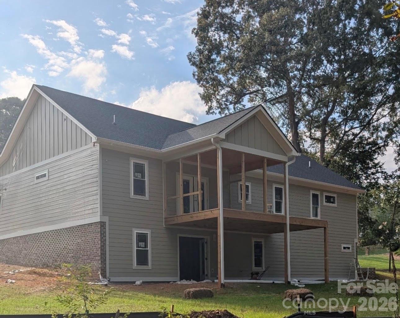 Rear view - Great screened in deck! - 1895 Knolls Drive, Newton