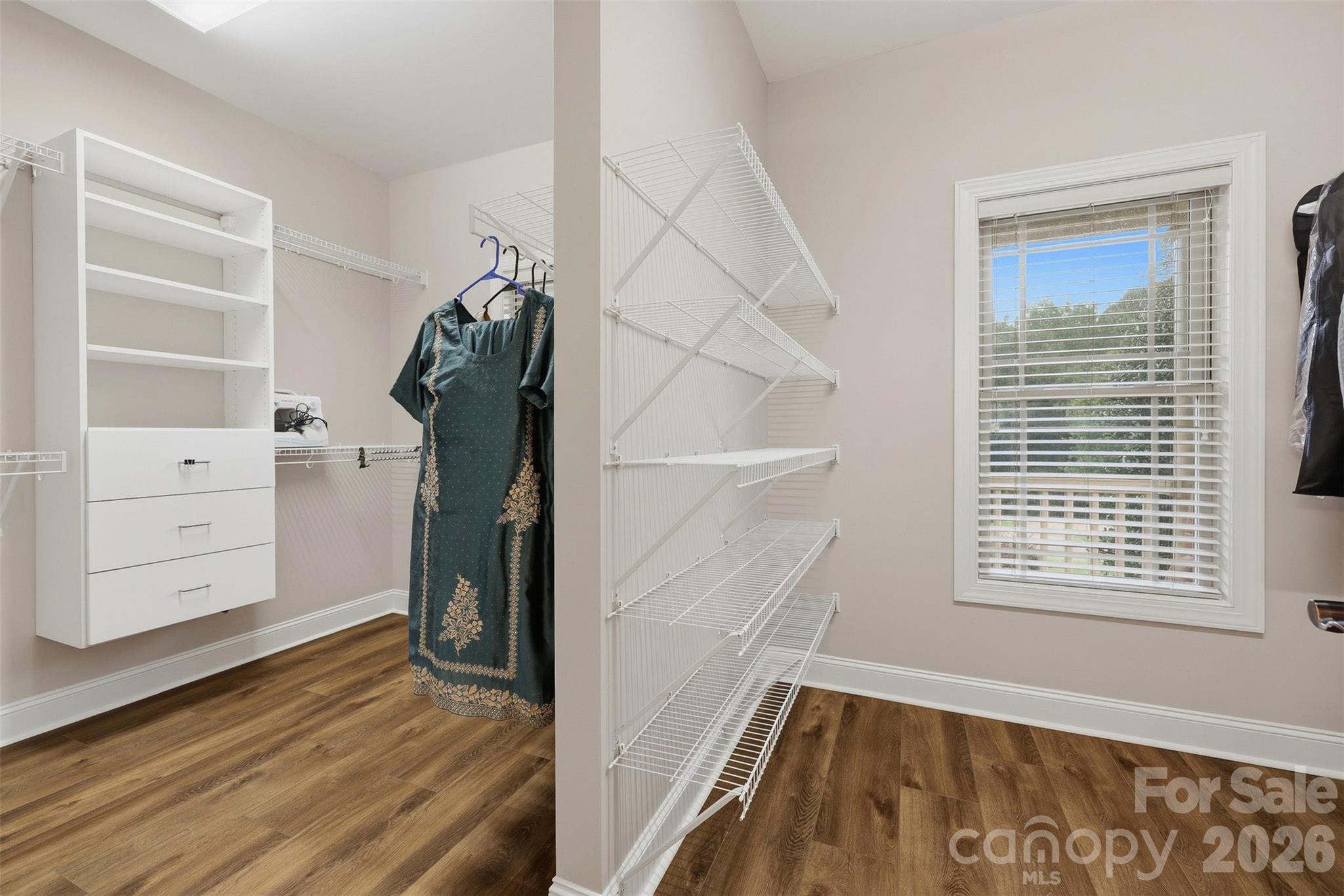 Primary walk-in closet - 1163 Willow Creek Drive, Newton