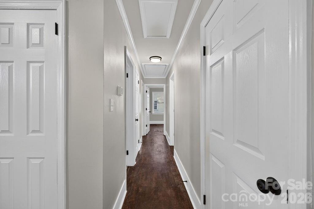 hallway to sleeping quarters and basement door entrance on right - 425 Roberts Street, Salisbury
