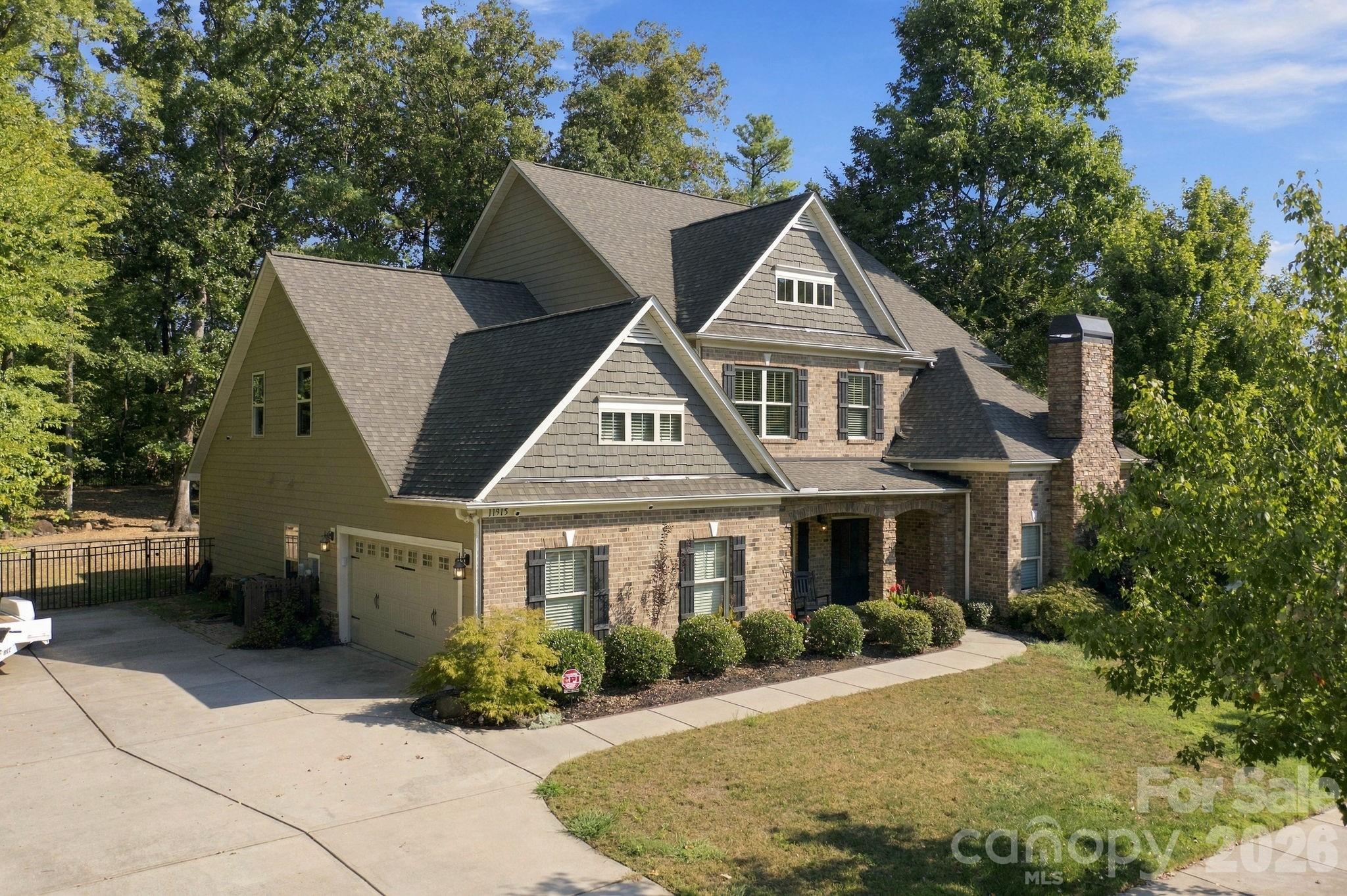 Single Family Residence at 11915 Red Sorrell Lane, Huntersville, photo 2 of 35