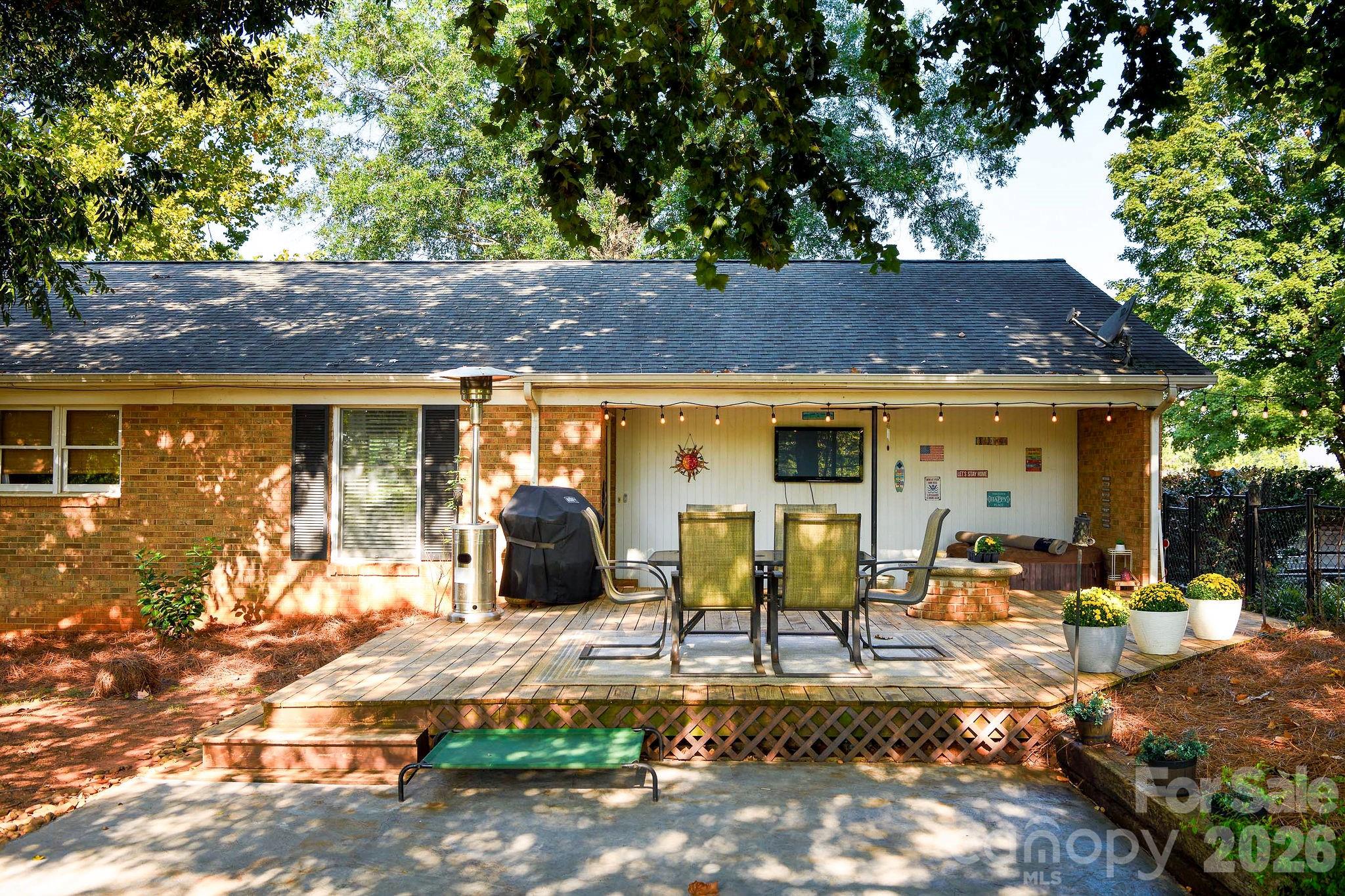 Covered patio area AND a deck in the private back yard! - 3910 Fallston Road, Shelby