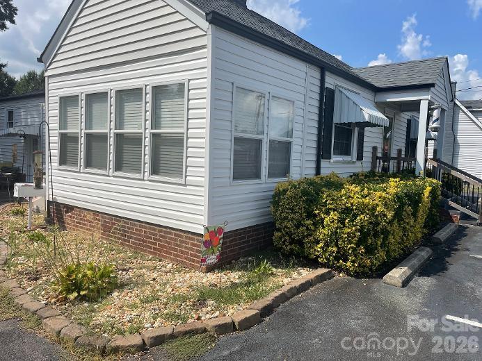 House Left Front View & Sunroom - 1670 Dale Earnhardt Boulevard, Kannapolis