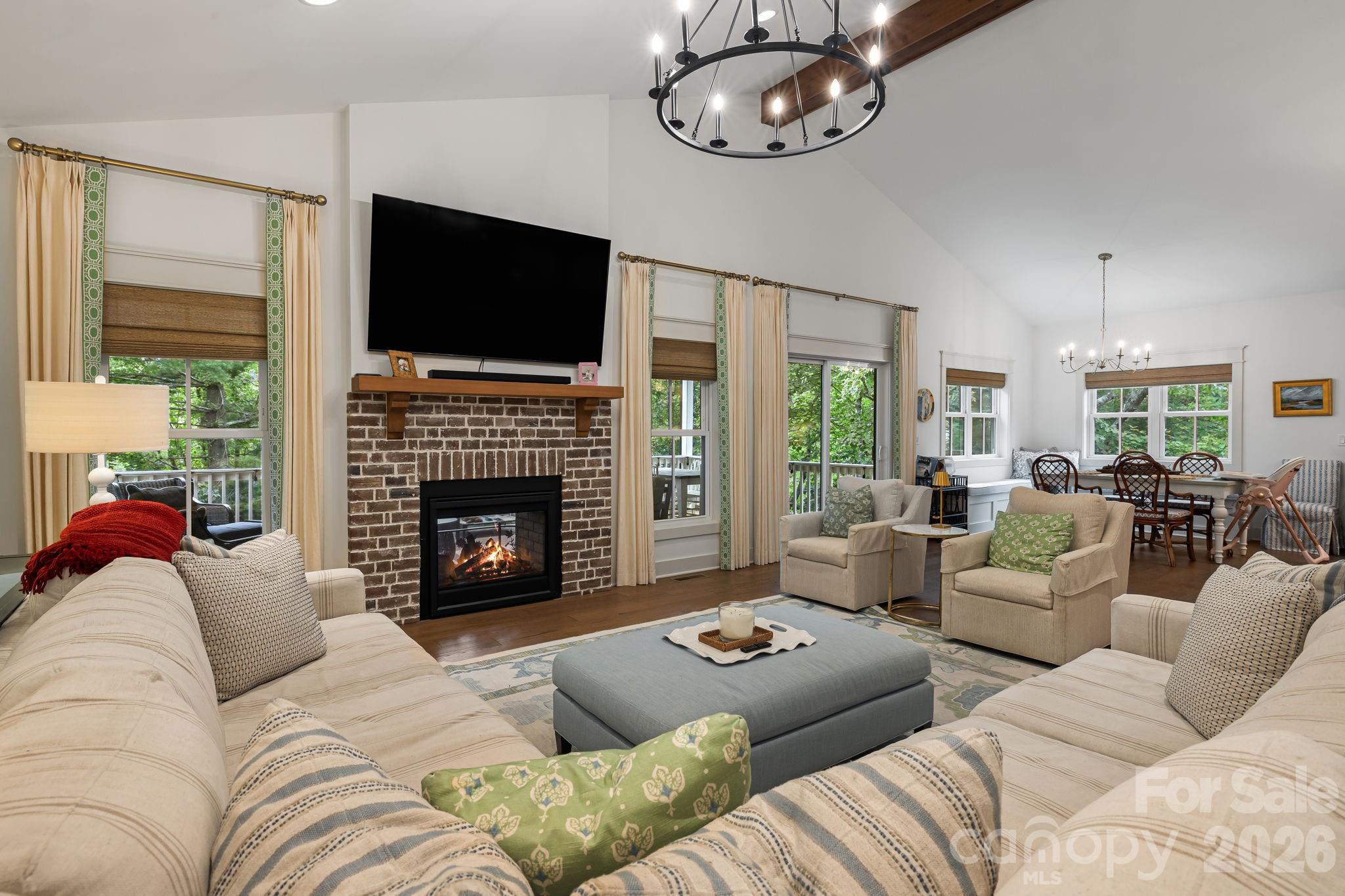 Living Room with Vaulted Ceilings and double sided gas logs. - 14 Sugarland Ridge Trail, Fairview
