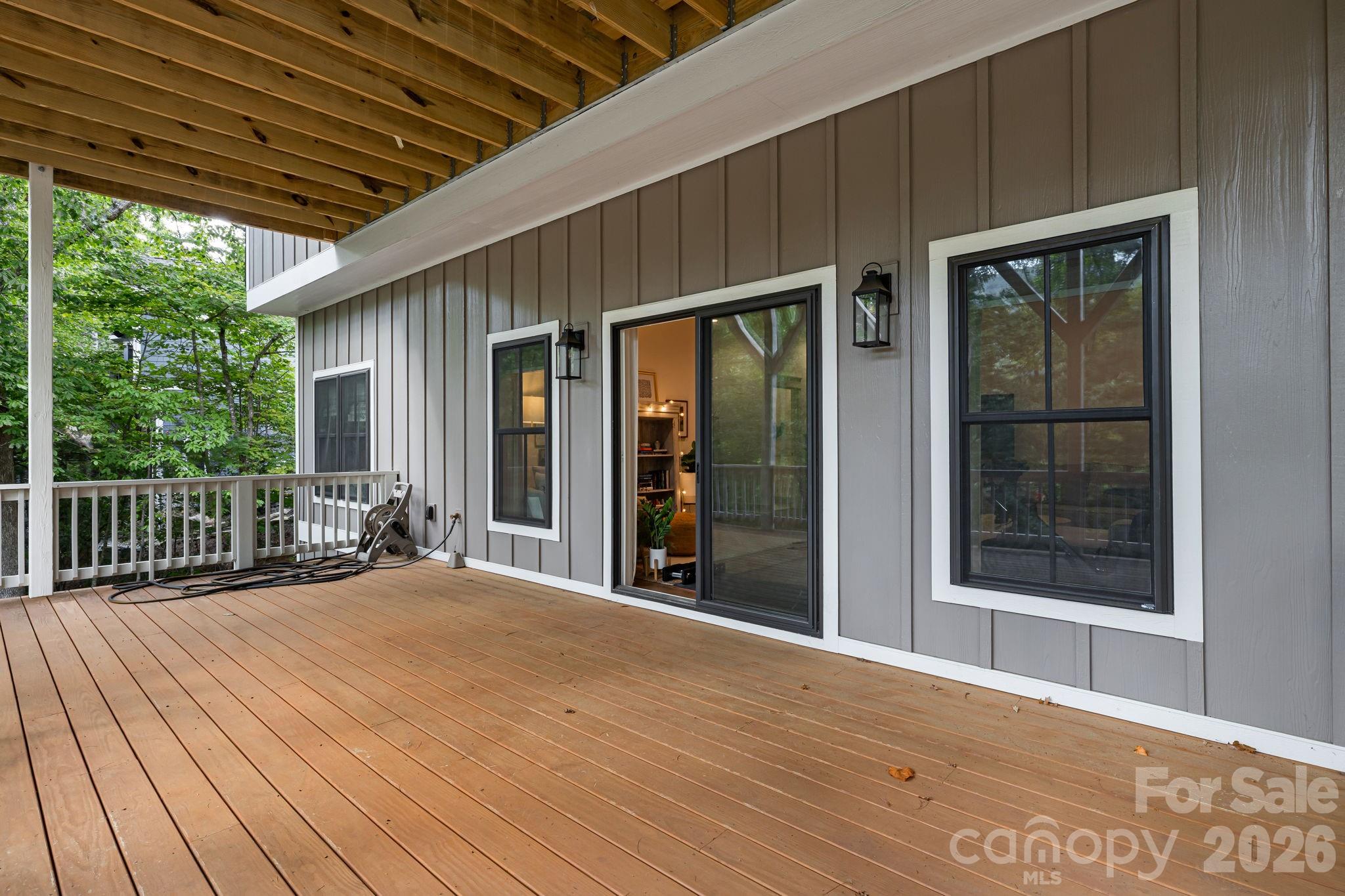 Lower Deck just off family room. Has stairs down to yard. - 14 Sugarland Ridge Trail, Fairview