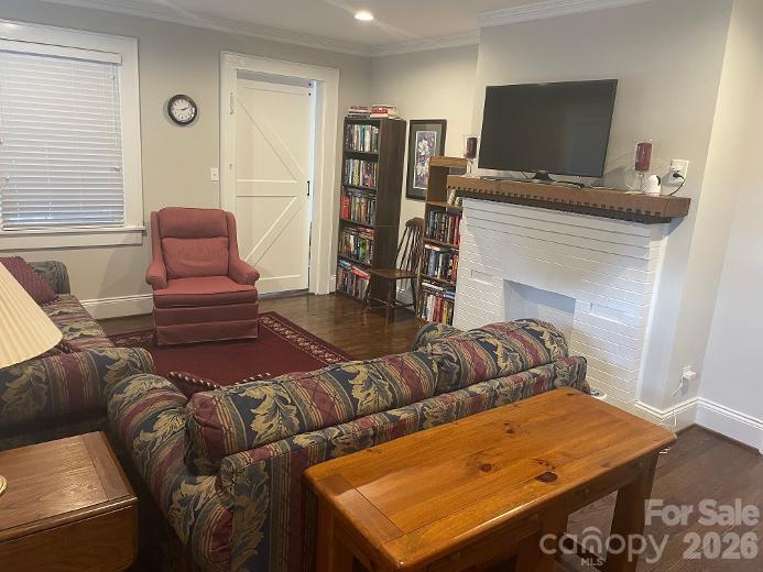 Living Room - 18' X 13' with vintage fireplace for cozy relaxation - 1670 Dale Earnhardt Boulevard, Kannapolis
