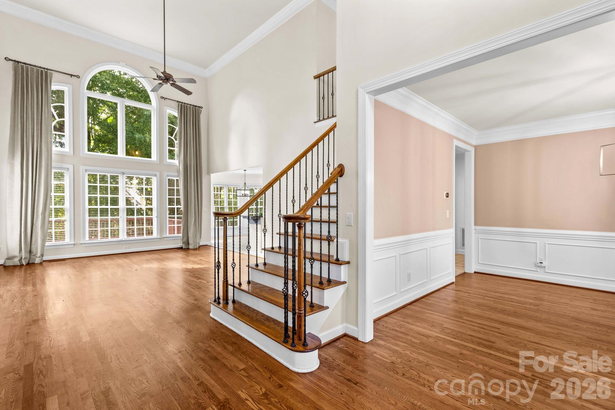 Open floorplan includes two-story great room, dining room, and office. - 12822 Cadgwith Cove Drive, Huntersville