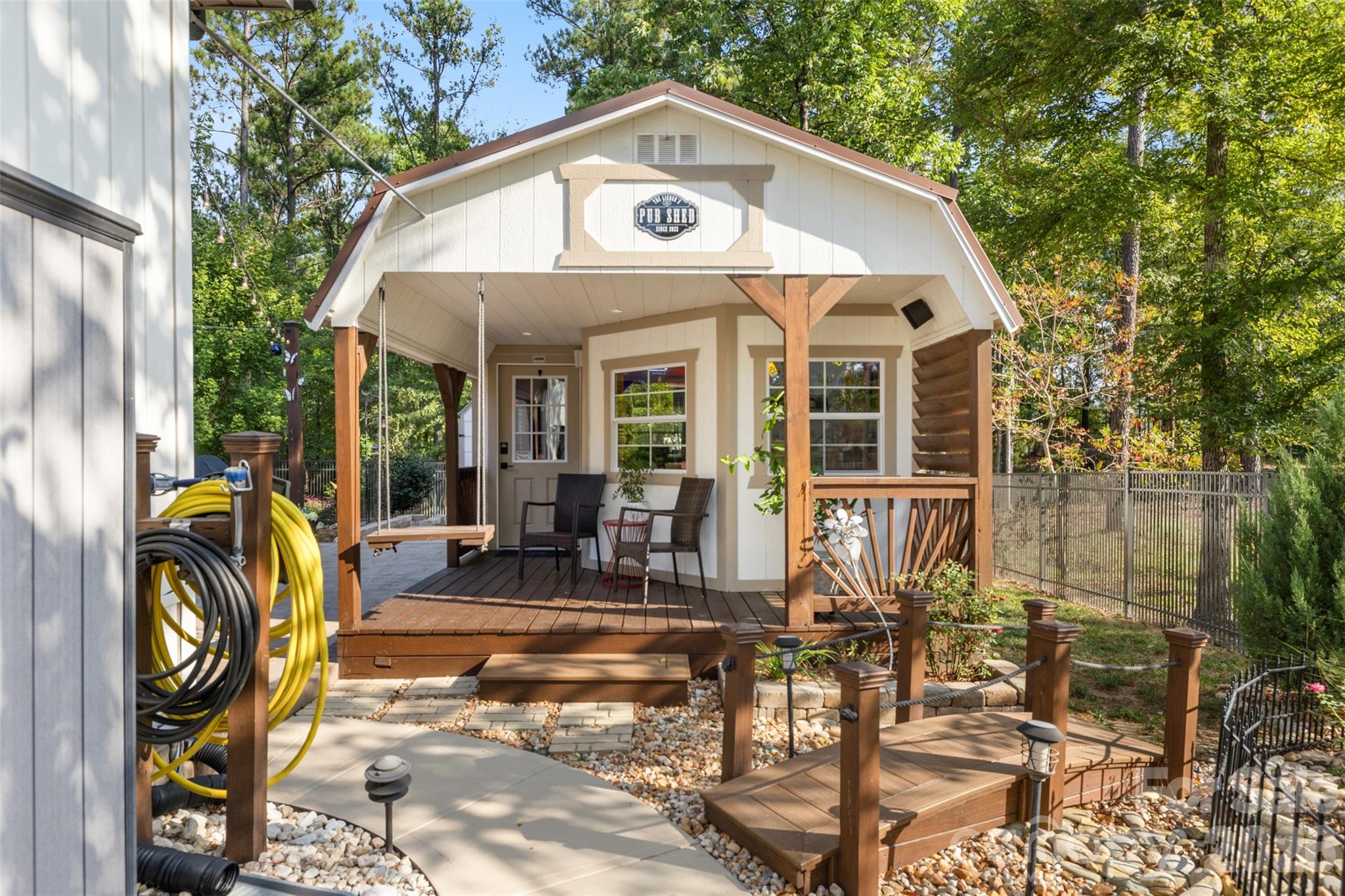Covered front porch gives the pub shed even more room to gather - 1604 Aragon Beach Road, Rock Hill