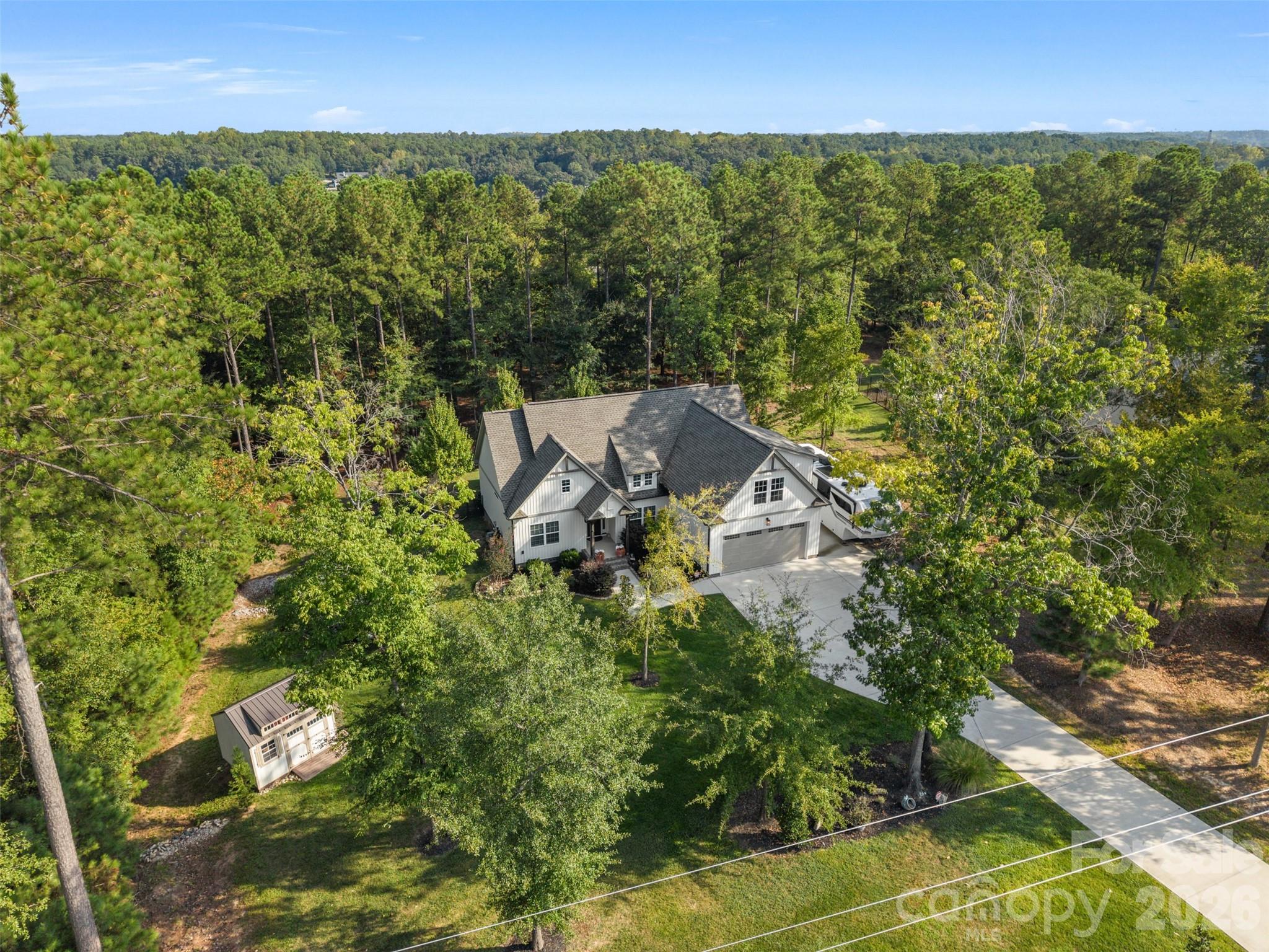 Beautifully situated home surrounded by mature trees and a spacious lawn - 1604 Aragon Beach Road, Rock Hill
