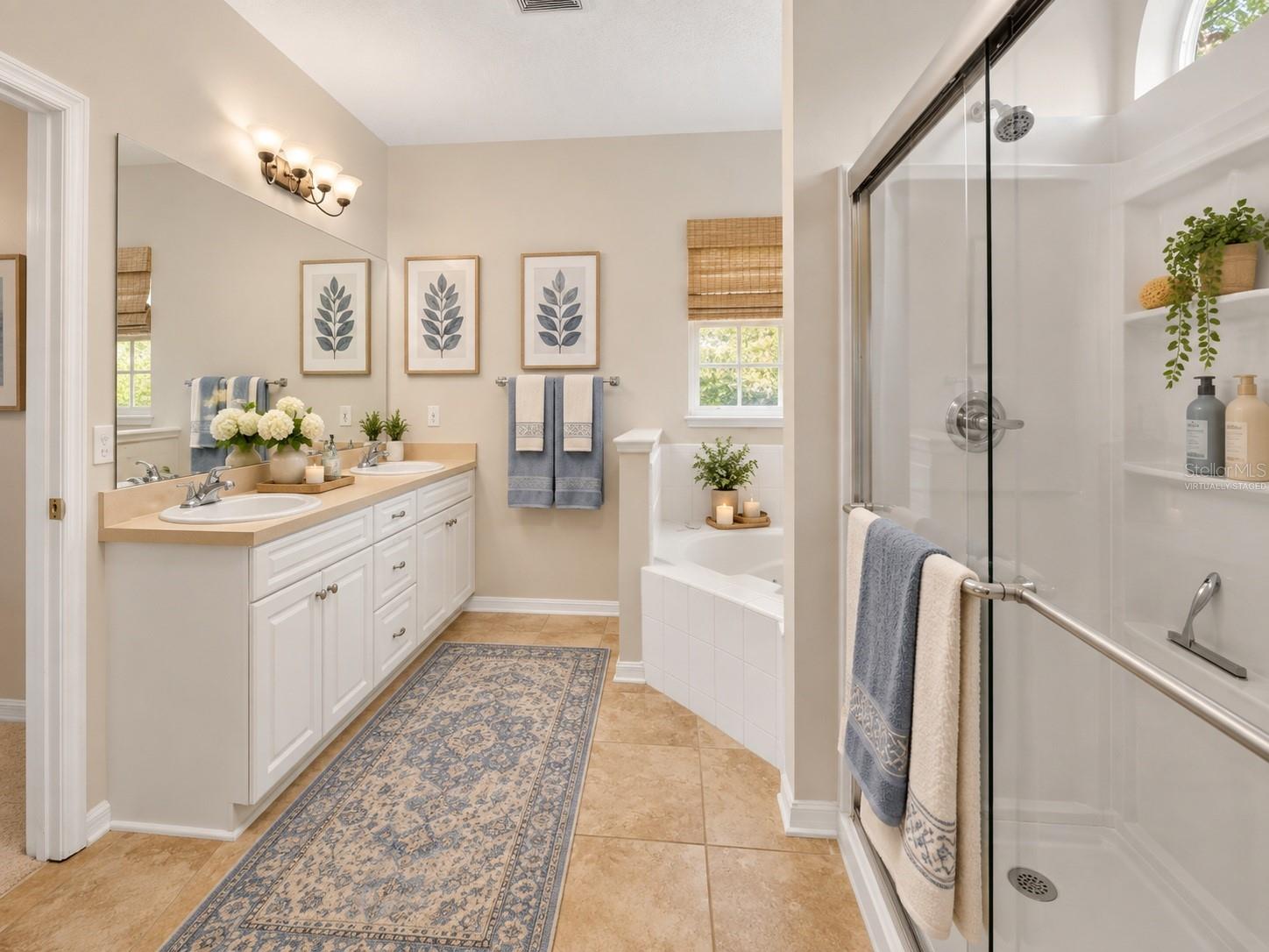 Double vanity primary bathroom, virtually staged - 6618 SW 83RD TER, GAINESVILLE