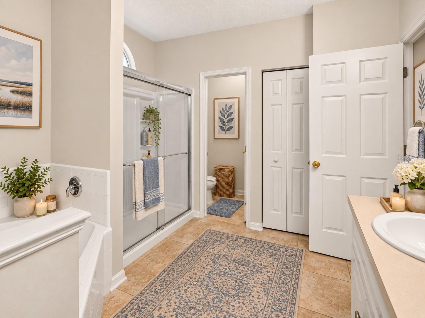 Spacious primary bathroom, virtually staged - 6618 SW 83RD TER, GAINESVILLE