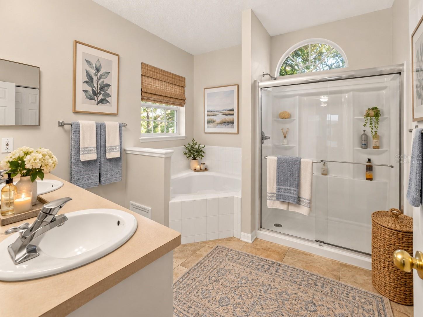 Light and bright primary bathroom, virtually staged - 6618 SW 83RD TER, GAINESVILLE