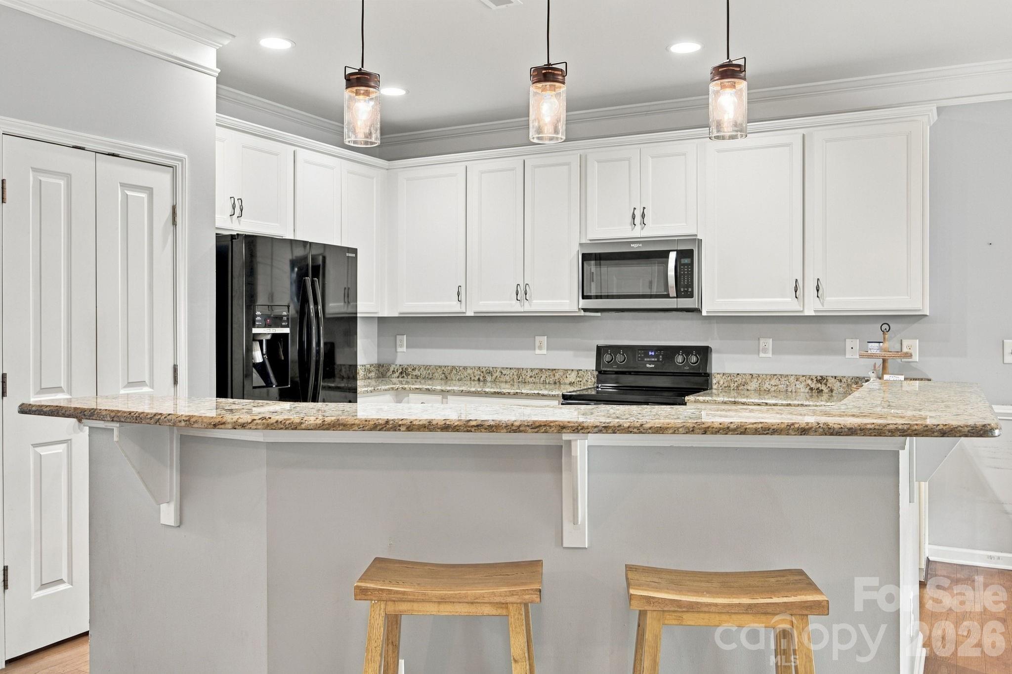 Large Kitchen Island - 5857 McClintock Drive, Denver
