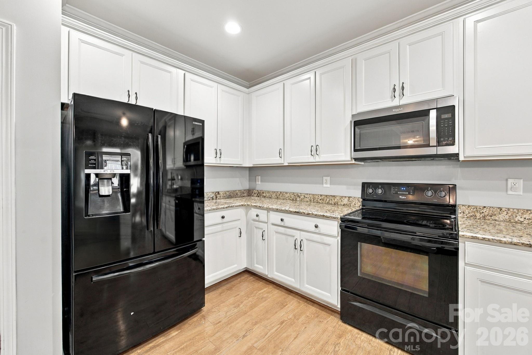 Black Appliances - 5857 McClintock Drive, Denver