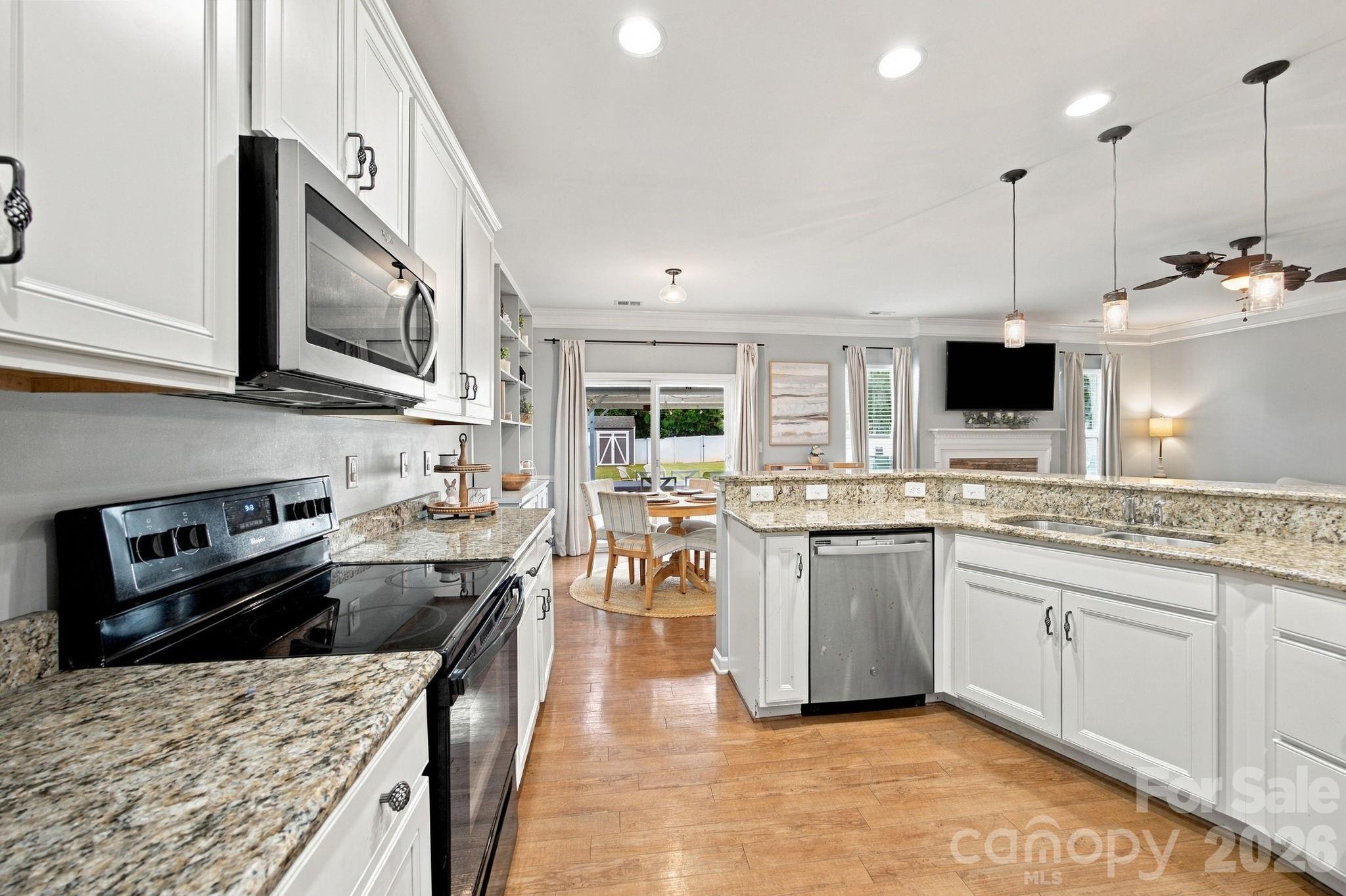 Kitchen and Breakfast area - 5857 McClintock Drive, Denver