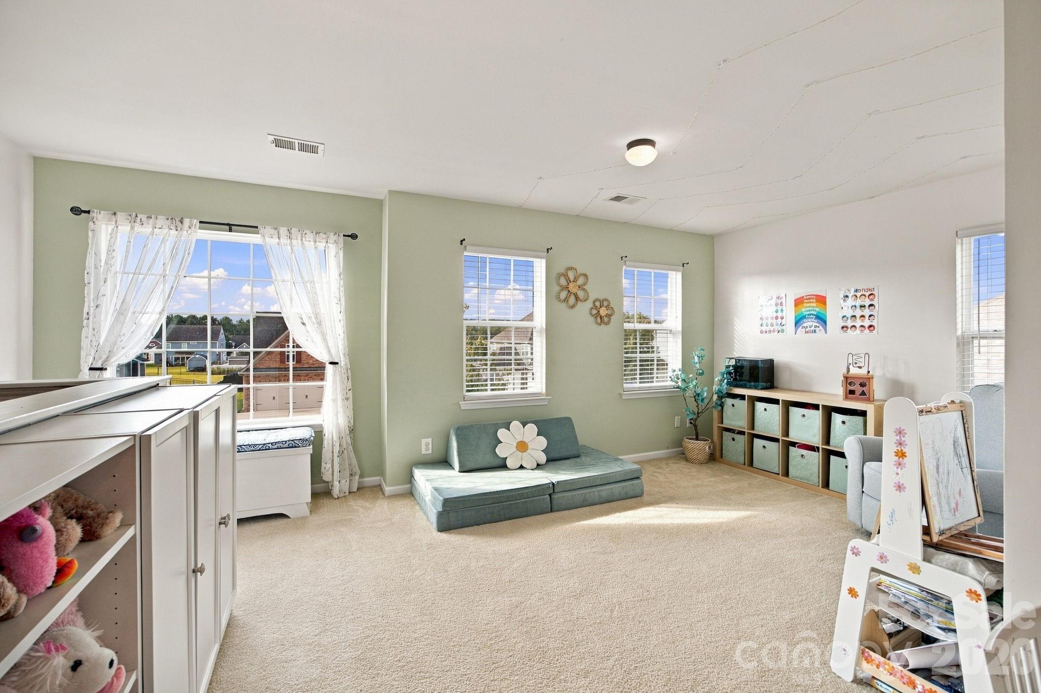 Large area with extra cabinets - 5857 McClintock Drive, Denver