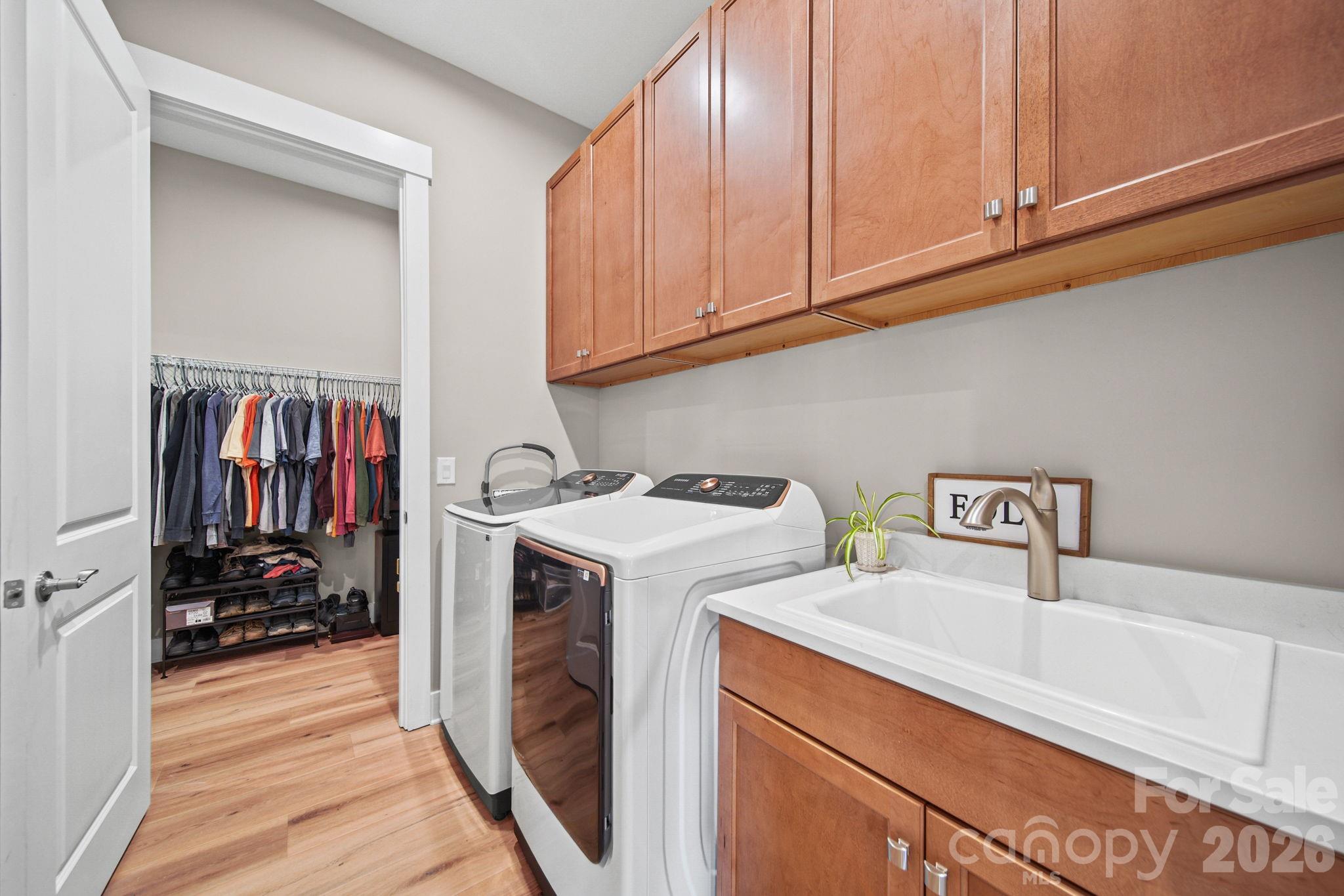 Laundry room leads into primary closet - 4007 Brush Creek, Monroe