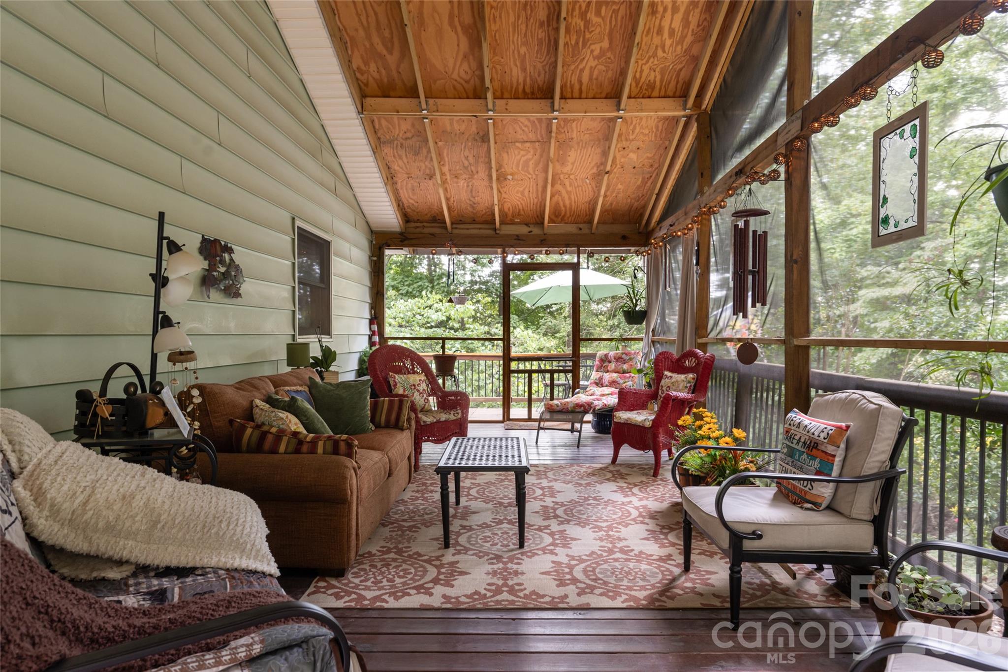 screened in side deck - 101 Guffey Mountain Road, Fairview