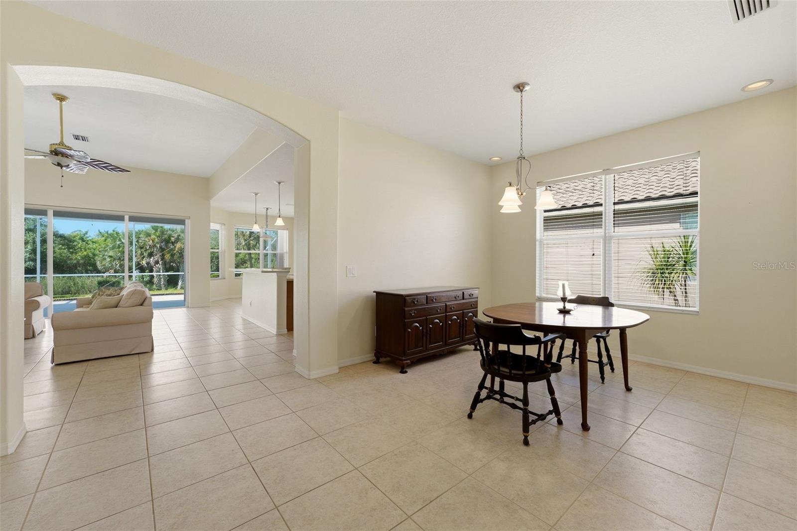 View from entrance hallway dining room - 5301 LAUREL OAK CT, NORTH PORT